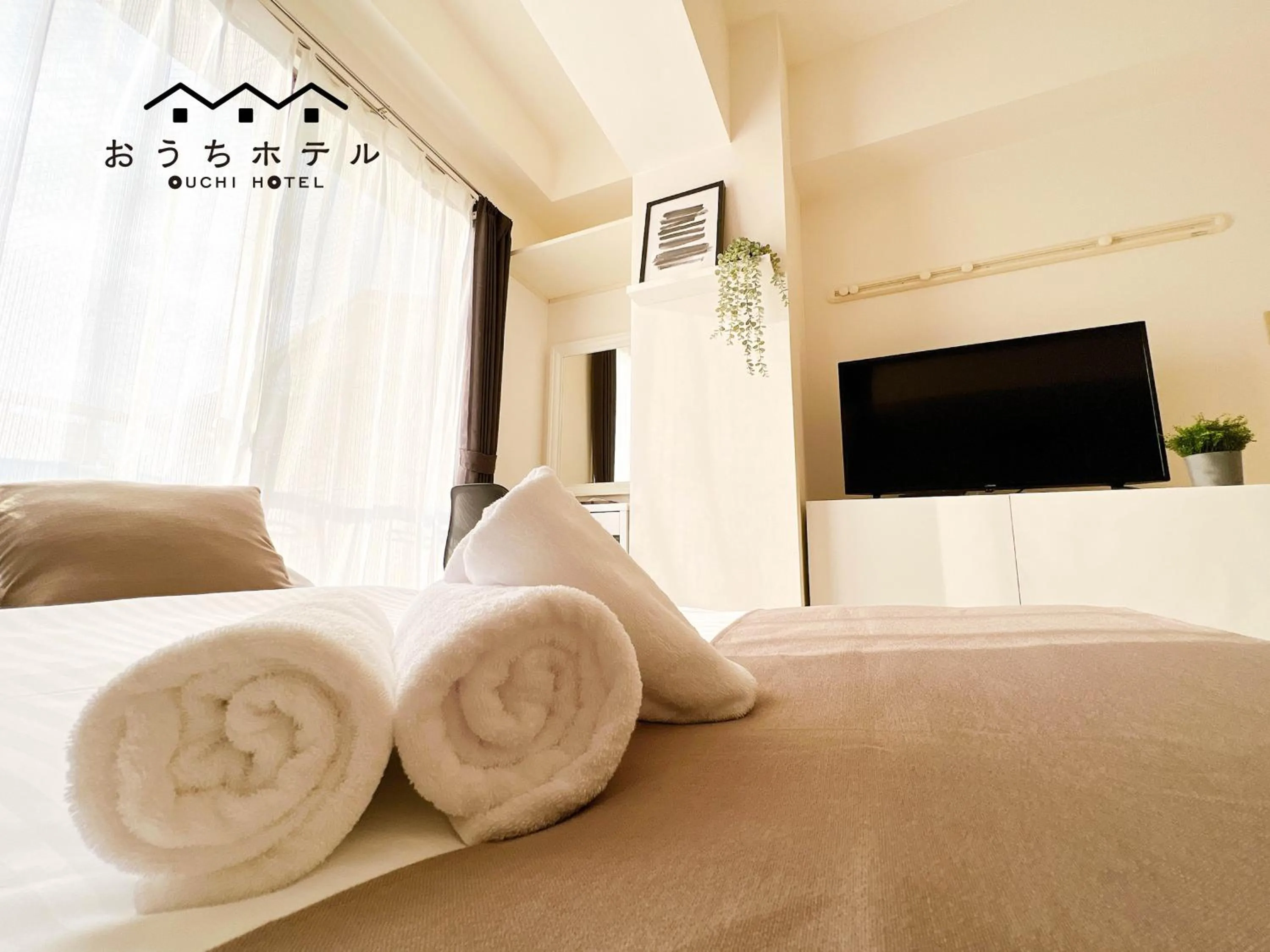 Bed in OUCHI HOTEL Fujimi