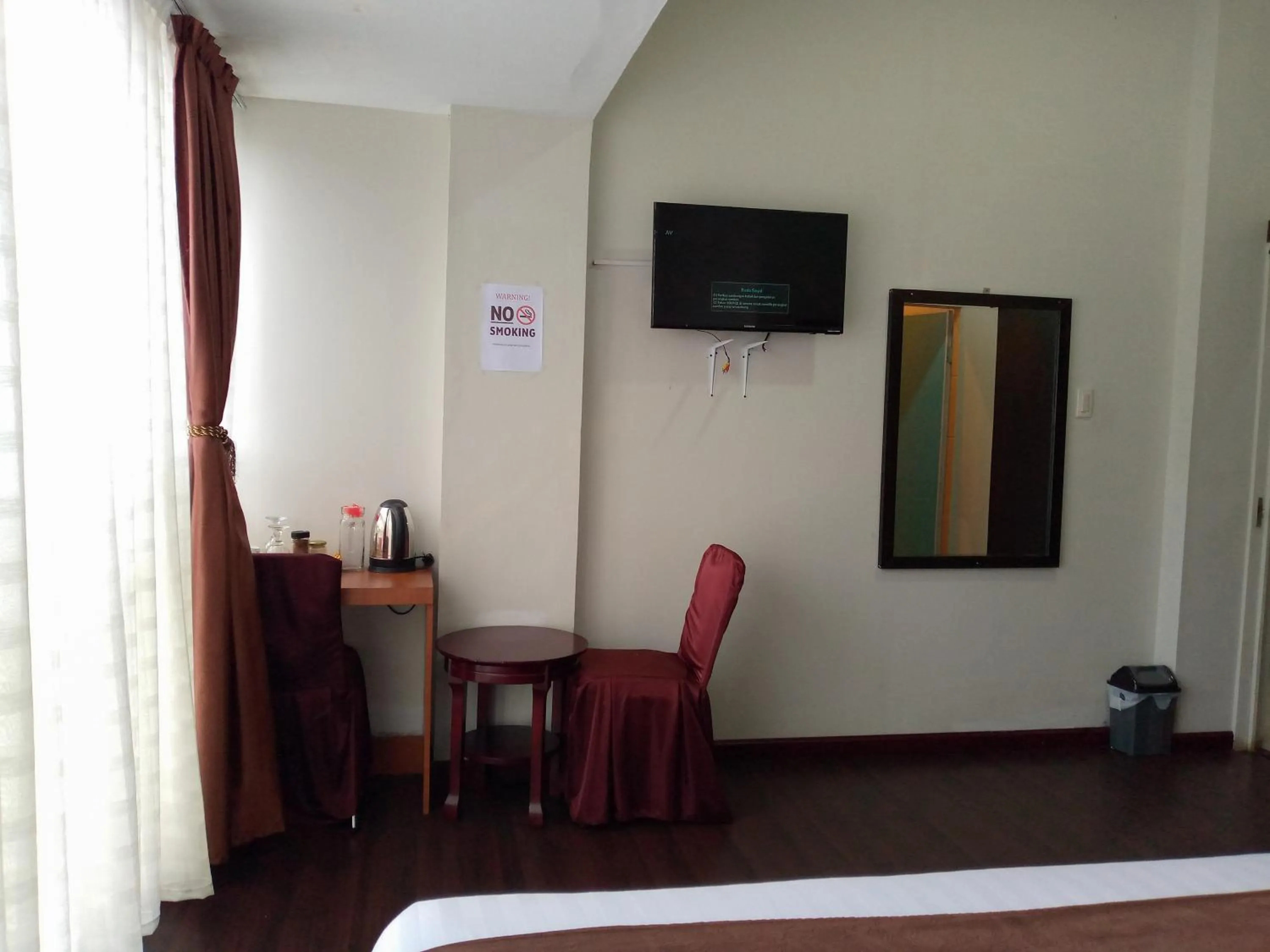 Bed in Hotel Belangi Syariah Taakengon Mitra RedDoorz