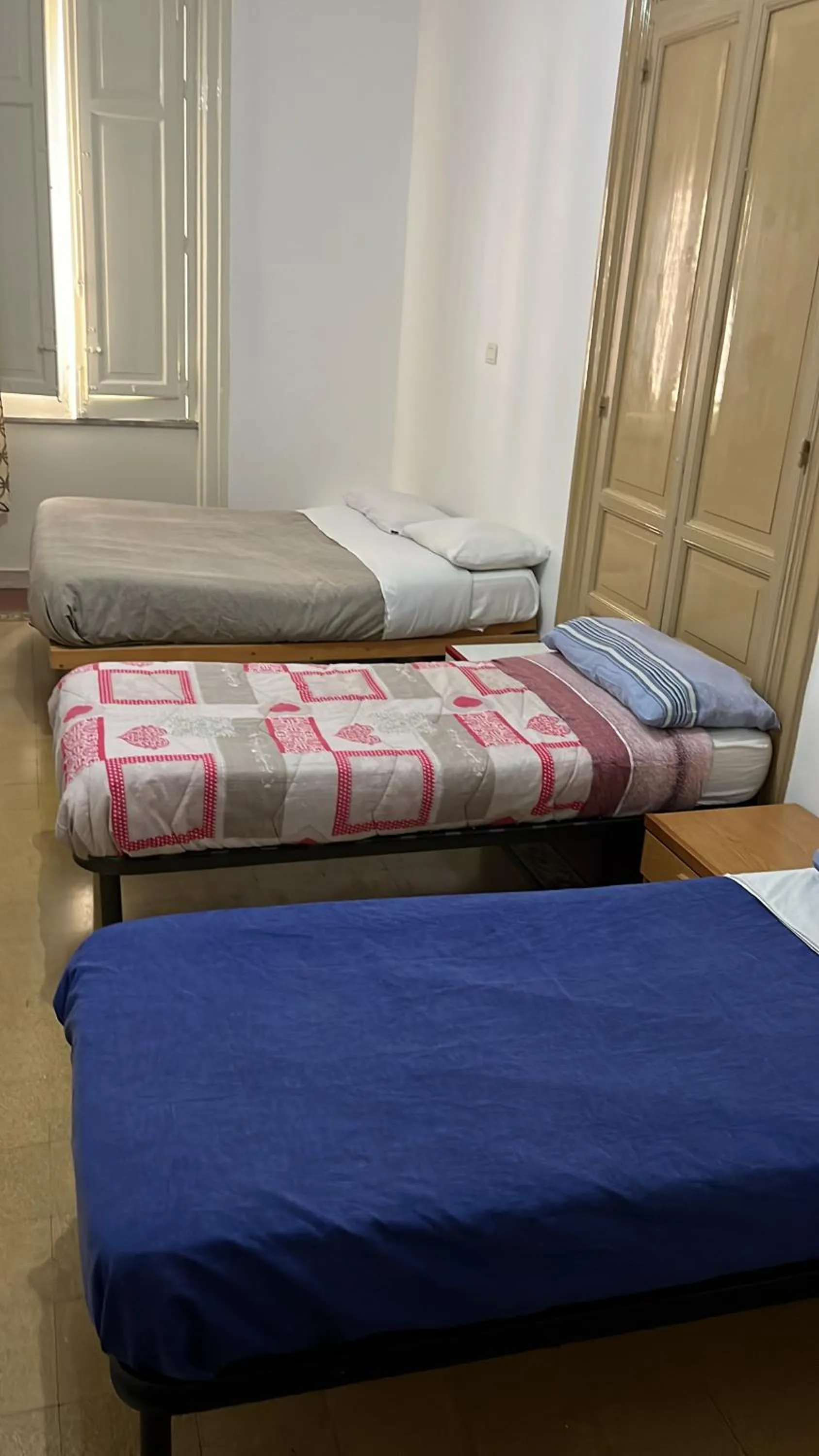 Bed in Manzoni rooms