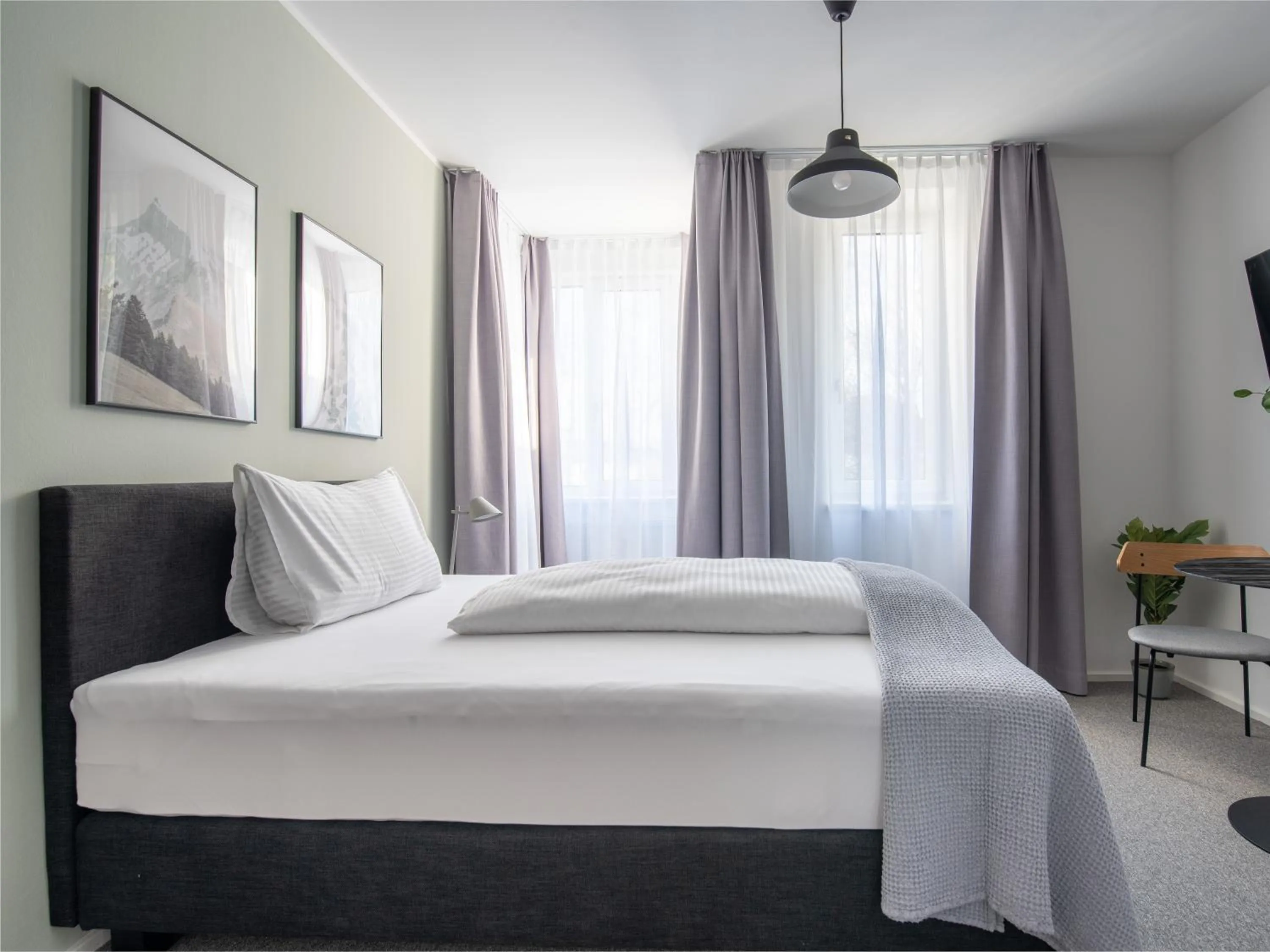 Bed in Limehome Linz Friedrichstraße