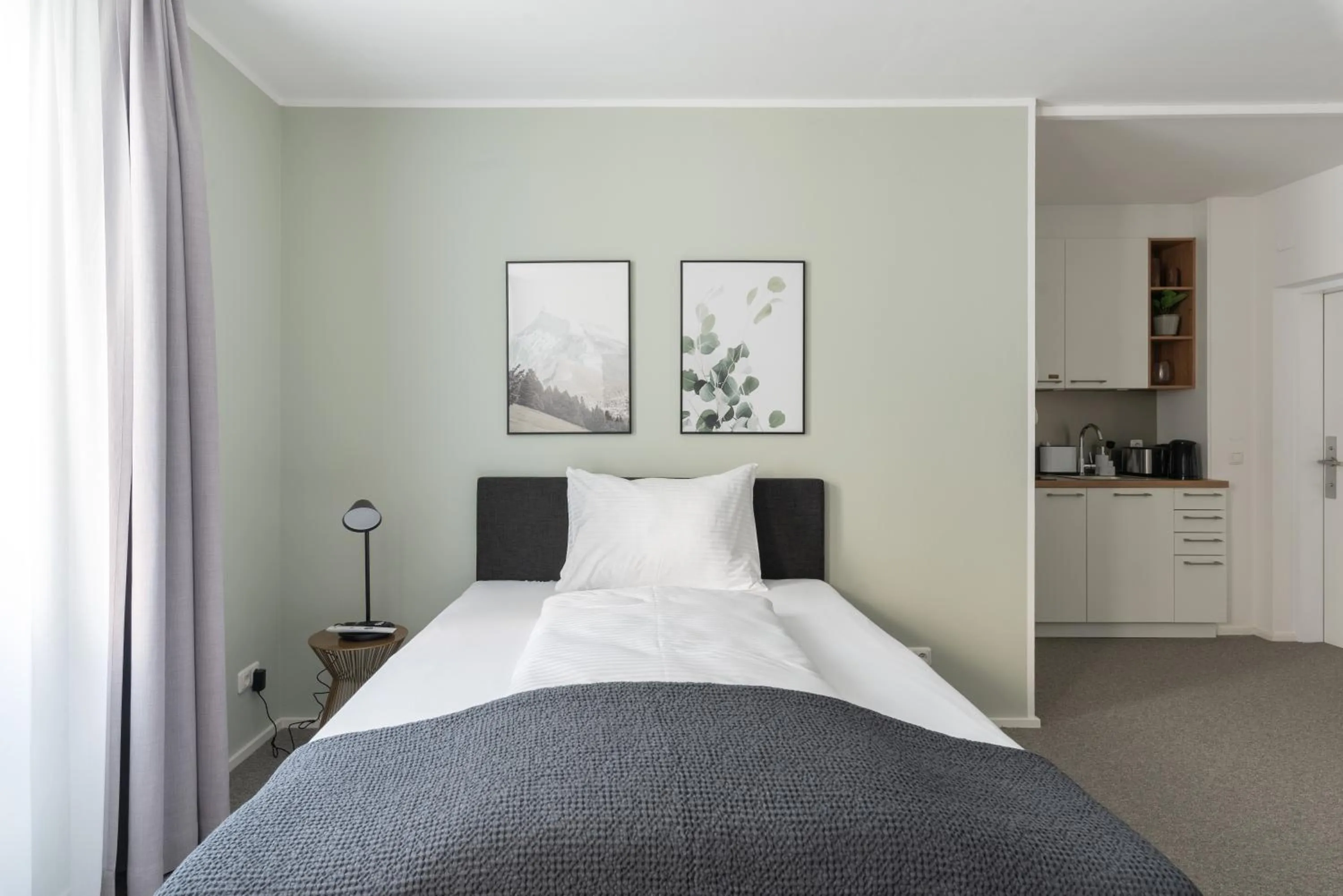 Bed in Limehome Linz Friedrichstraße