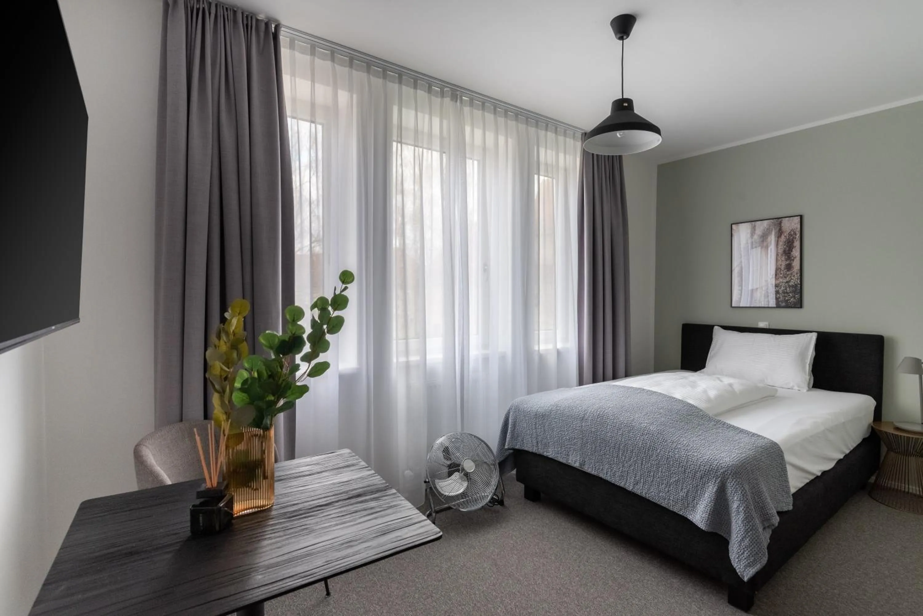 Bed in Limehome Linz Friedrichstraße