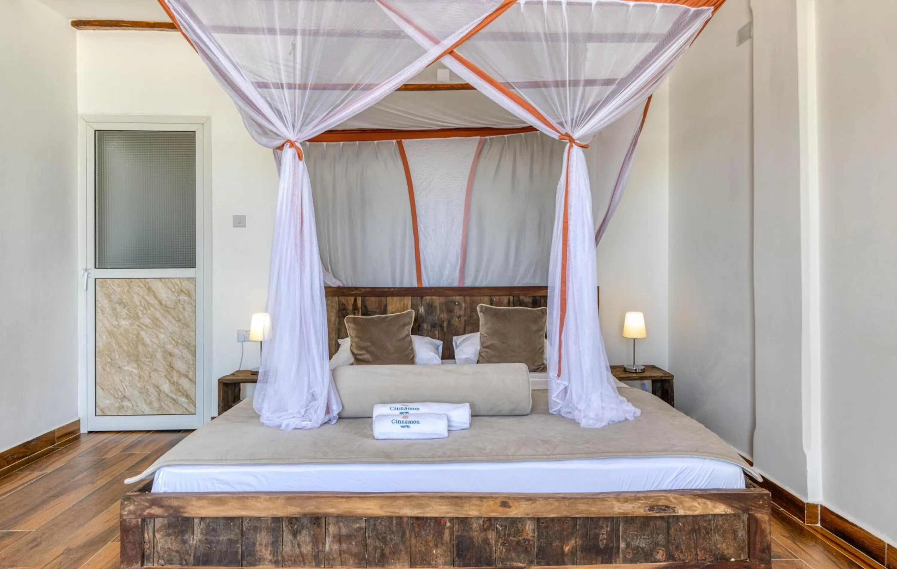 Bed in Cinnamon Hotel