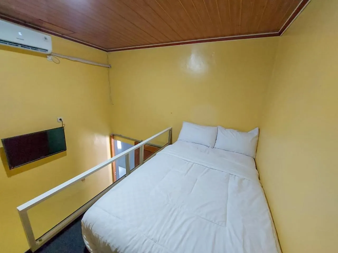 Bed in Guest House Kembar Syariah Semarang RedPartner