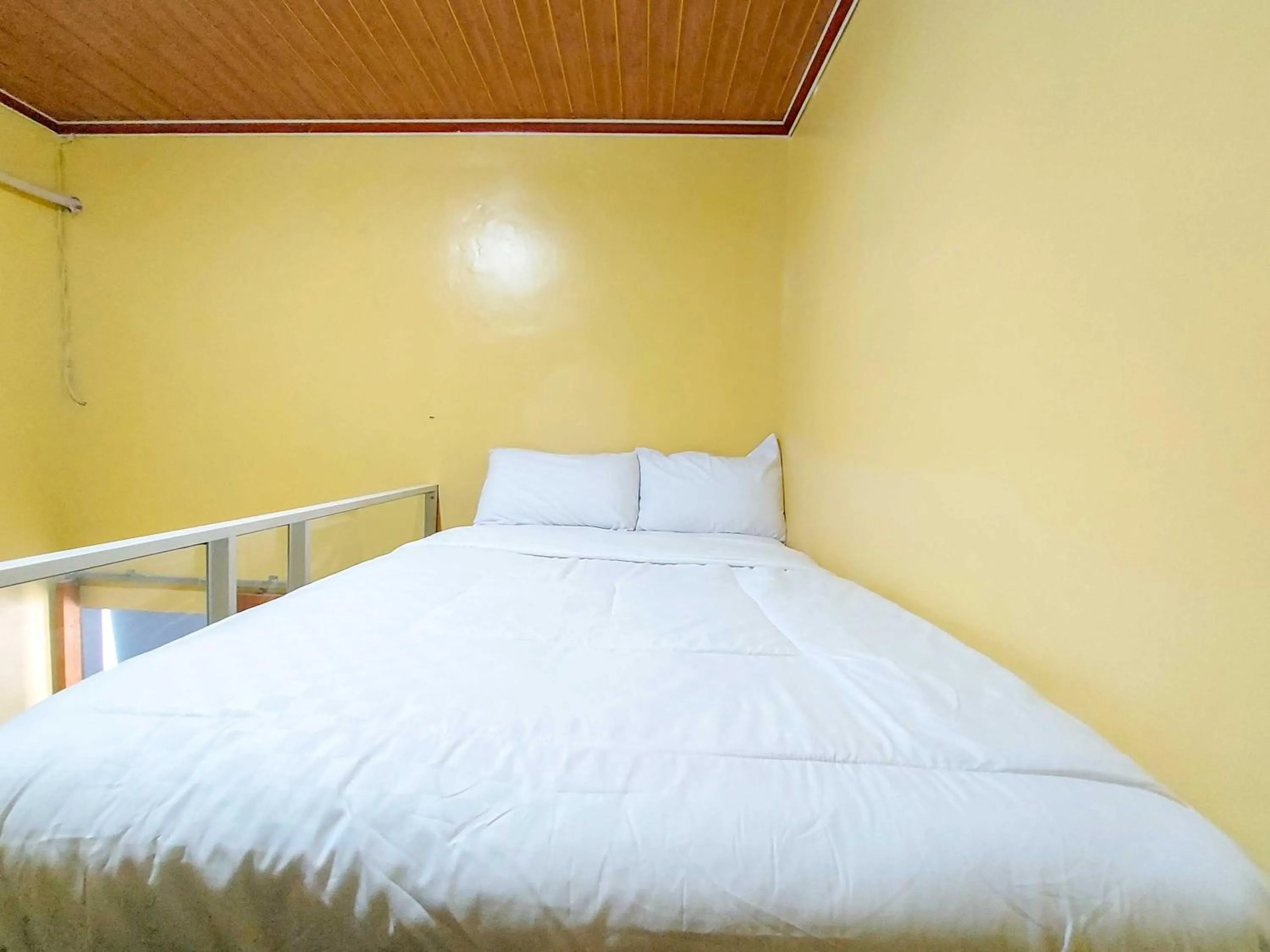 Bed in Guest House Kembar Syariah Semarang RedPartner