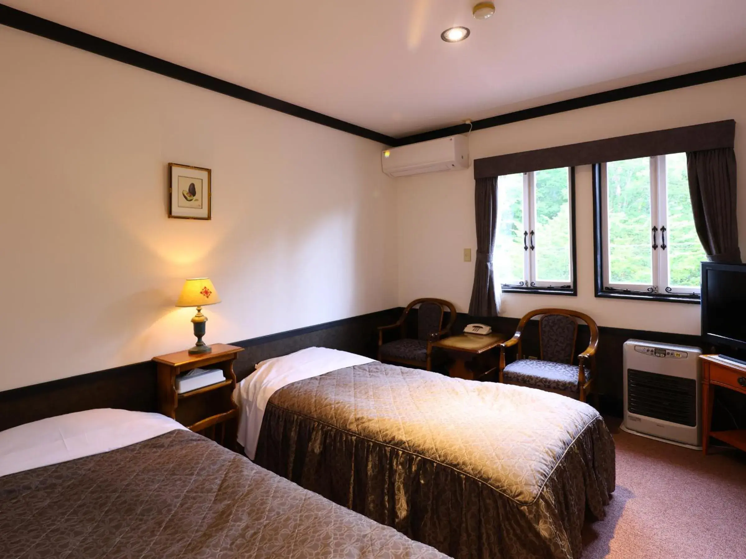 Economy Twin Room - single occupancy in Petit Hotel & Restaurant Old Age Economy Twin Room - single occupancy in Petit Hotel & Restaurant Old Age