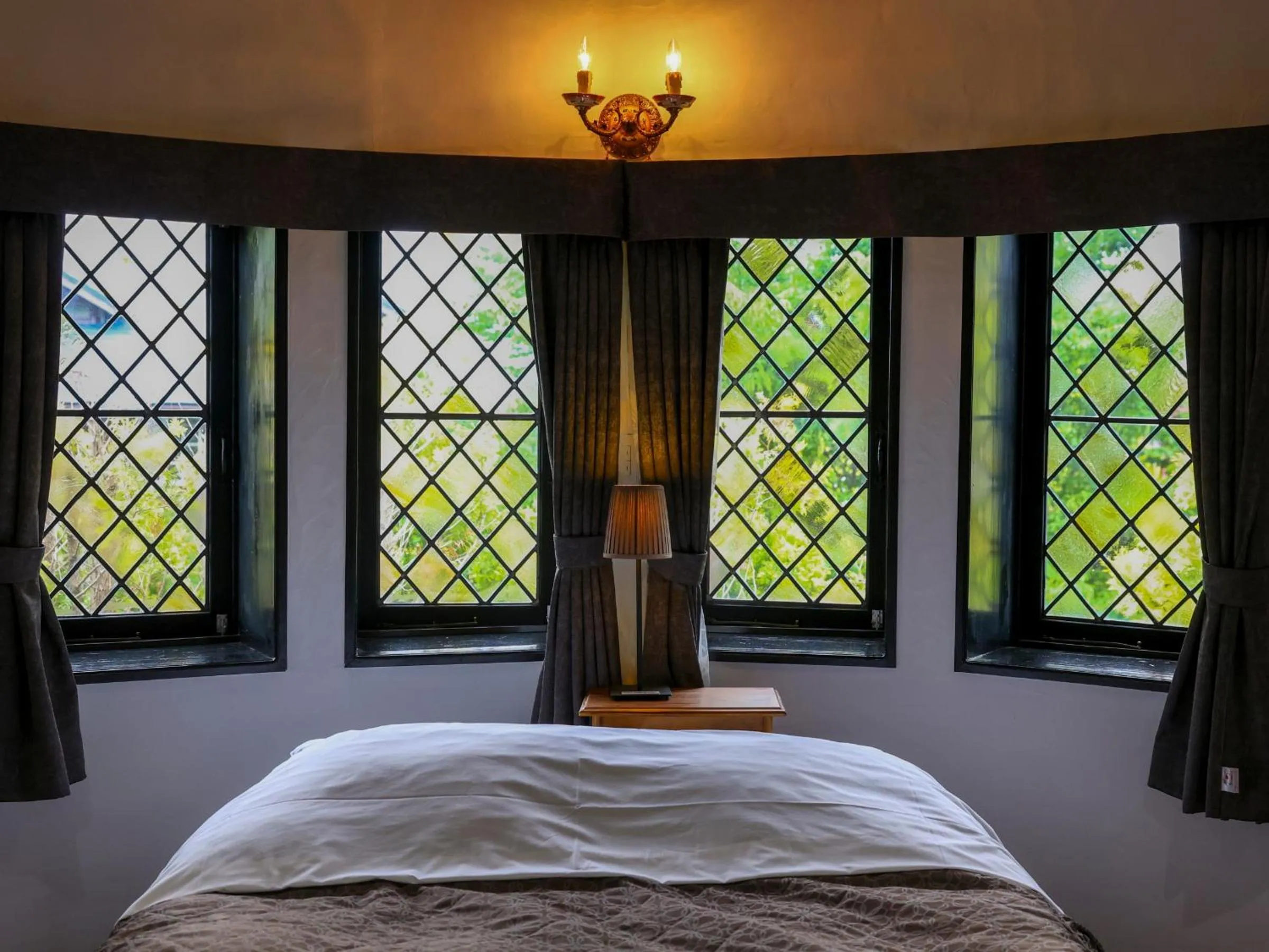 Bed in Petit Hotel & Restaurant Old Age