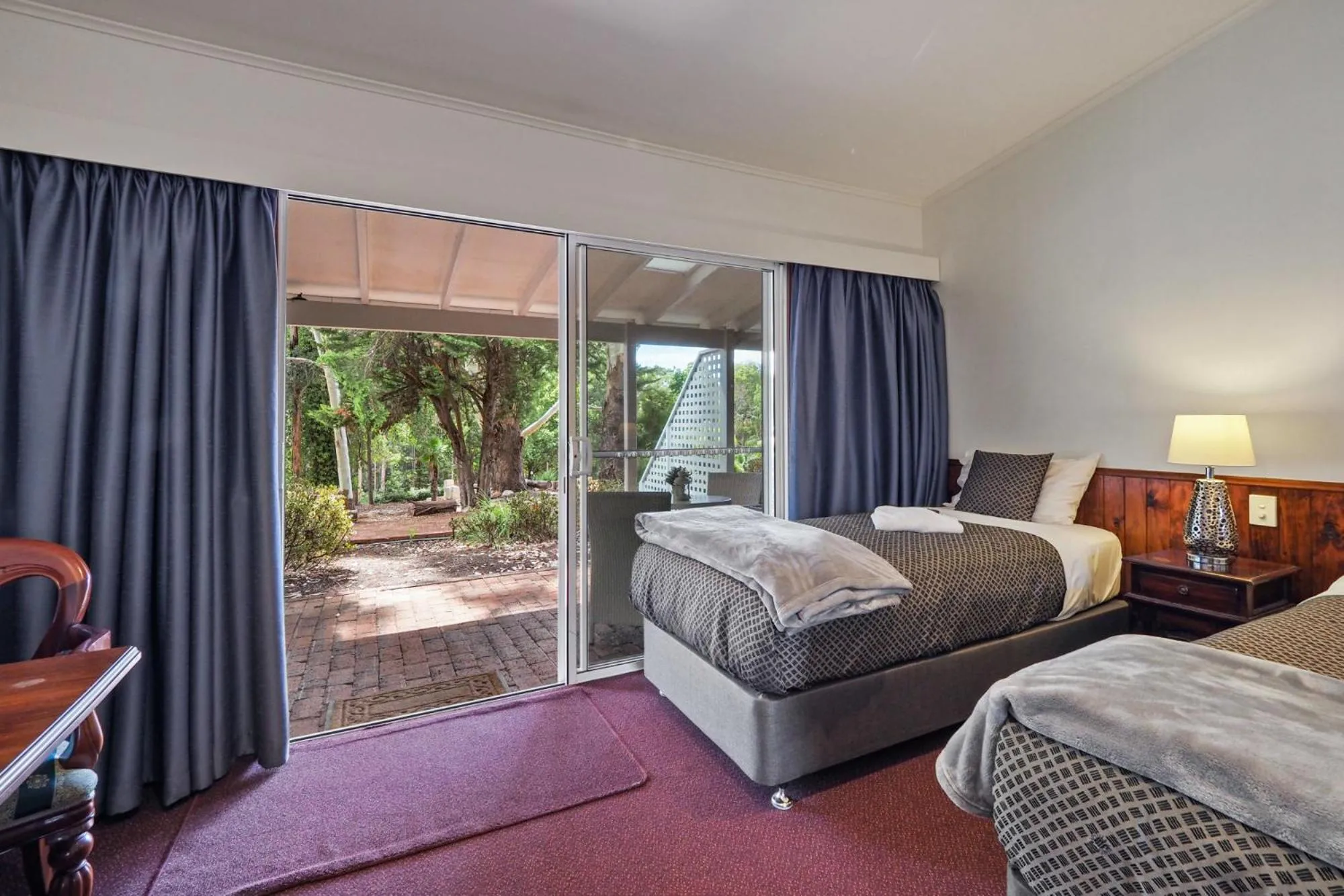 Bed in Forest Lodge Resort