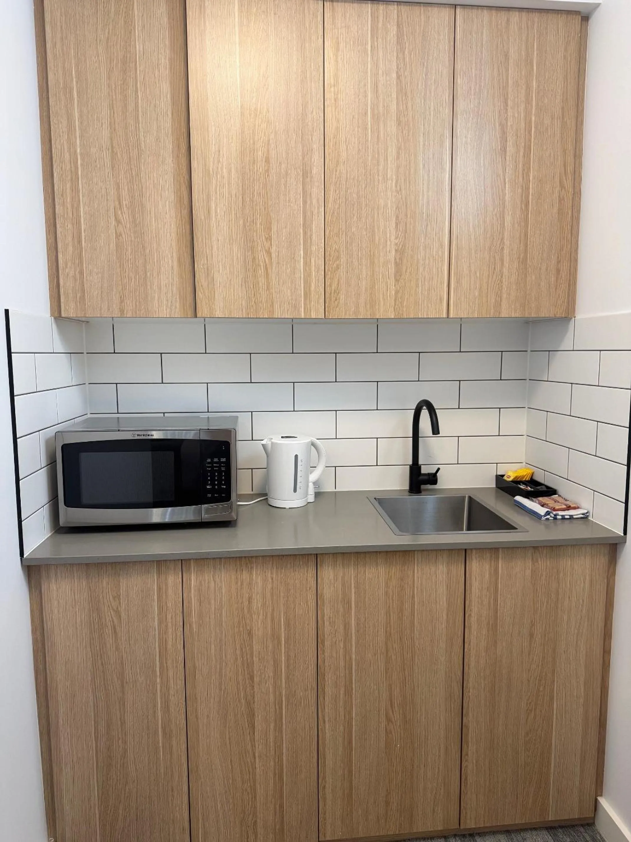 Kitchen or kitchenette in The Osmond Motel & Apartments