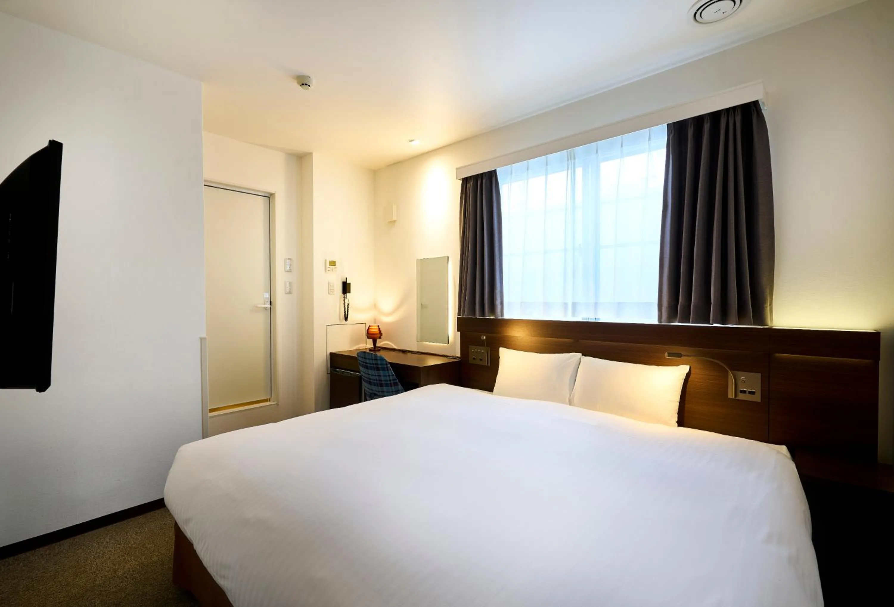 Bed in Tassel Inn Kyoto Kawaramachi Nijo