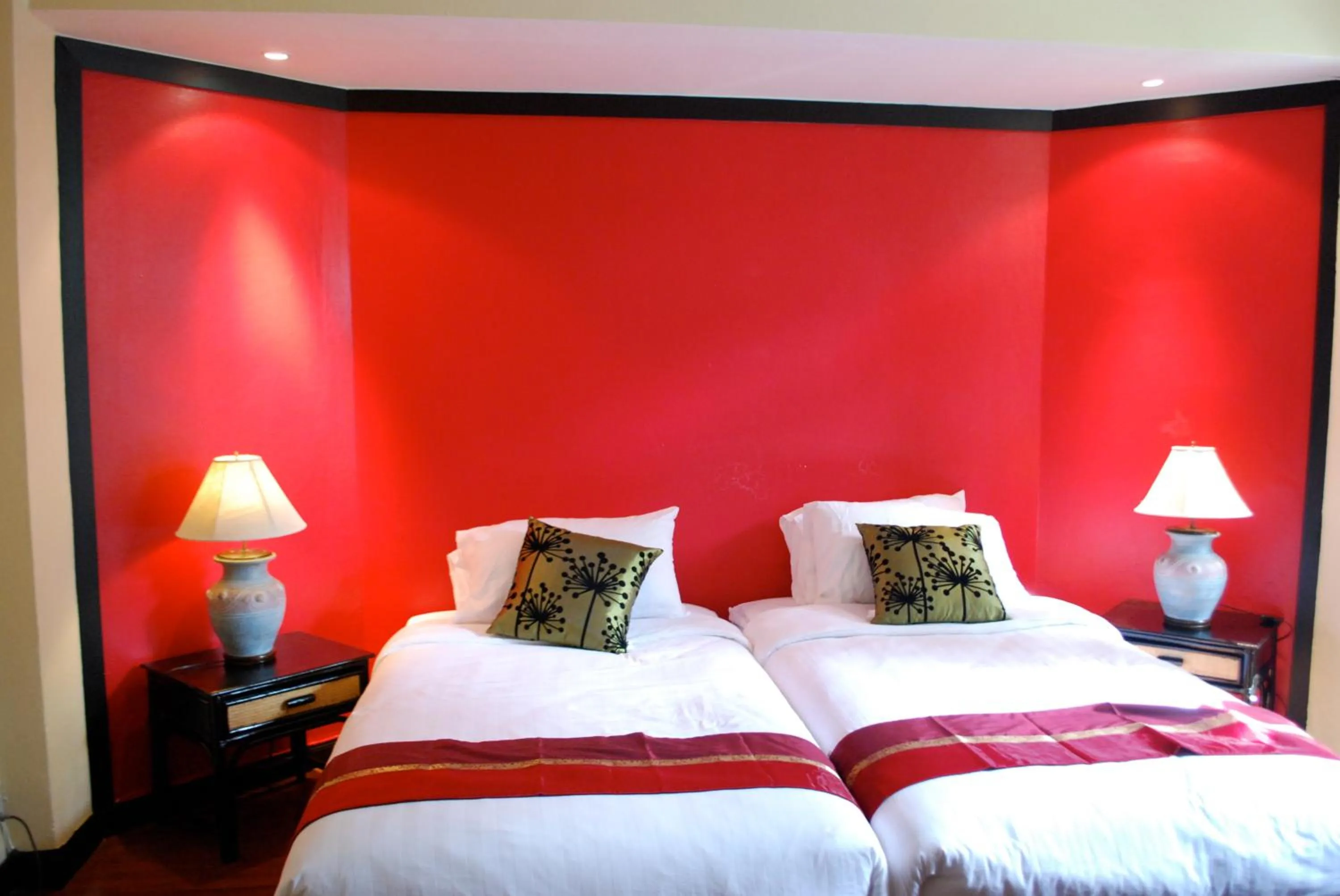 Bed in Sunset Apartment Phuket