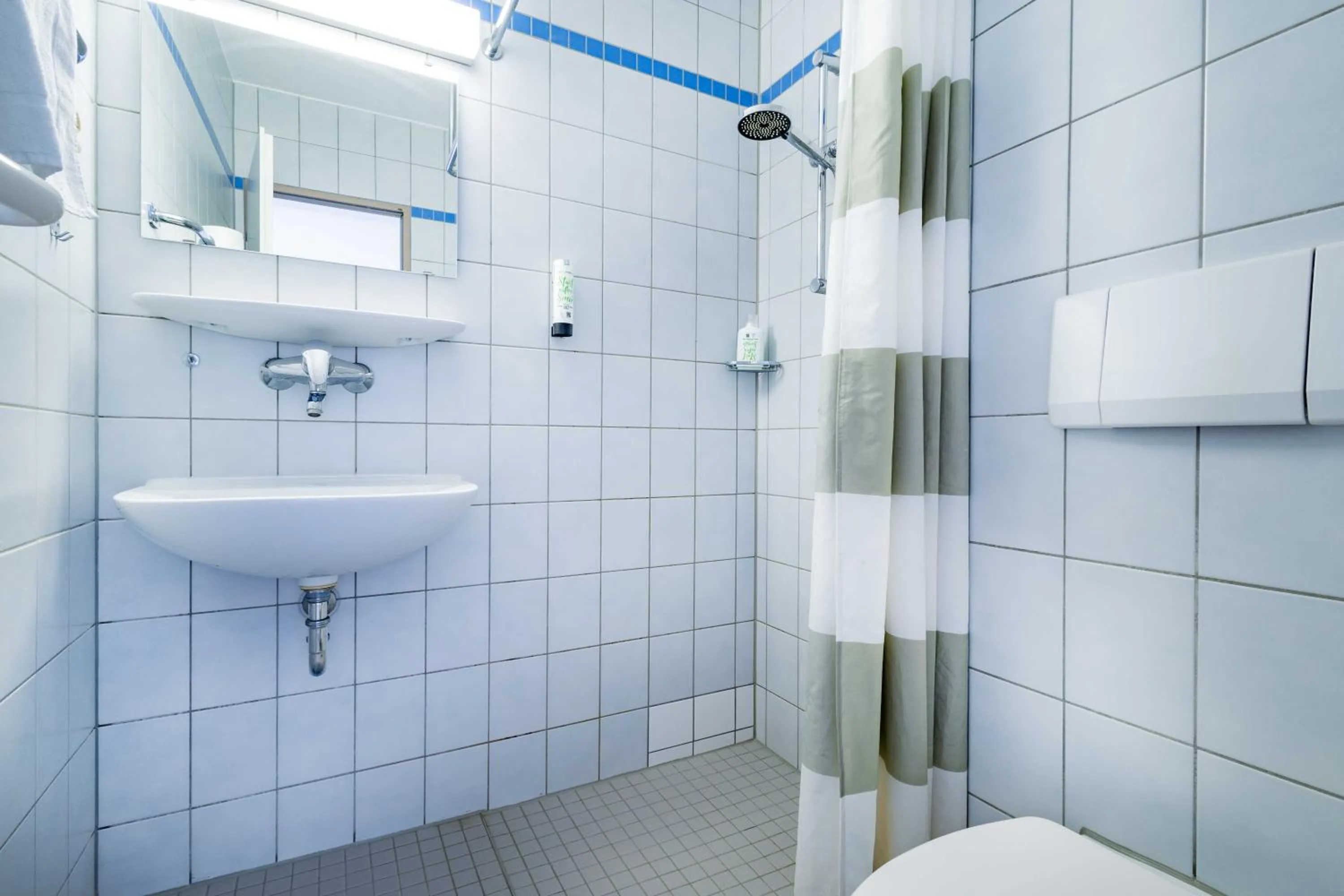 Shower in StayInn Hostel und Gästehaus