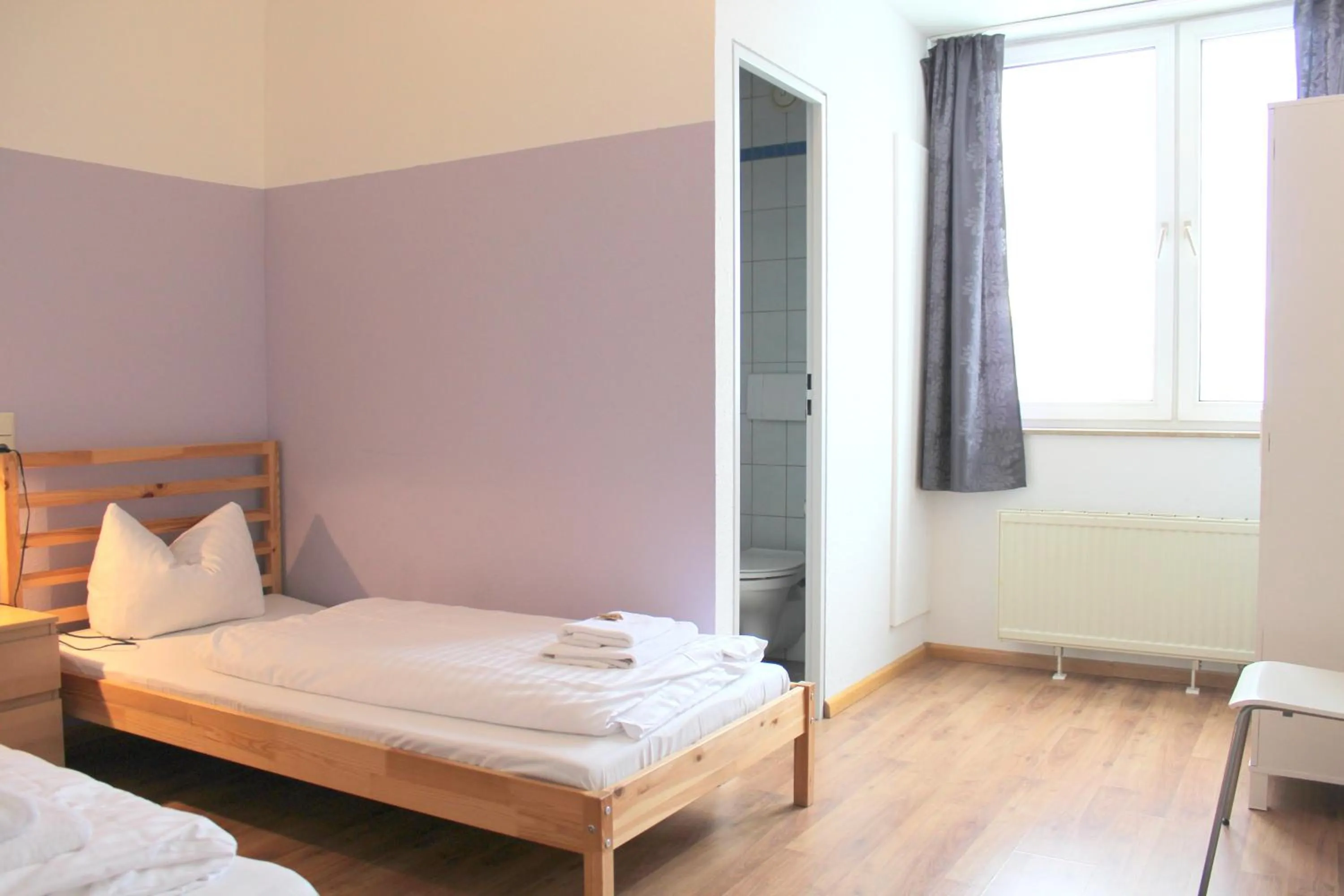 Bed in StayInn Hostel und Gästehaus