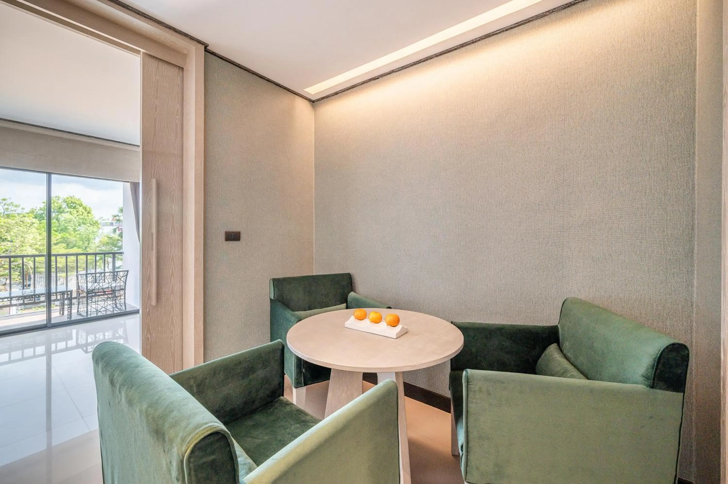 Living room in Manhattan Pattaya Hotel - SHA Extra Plus