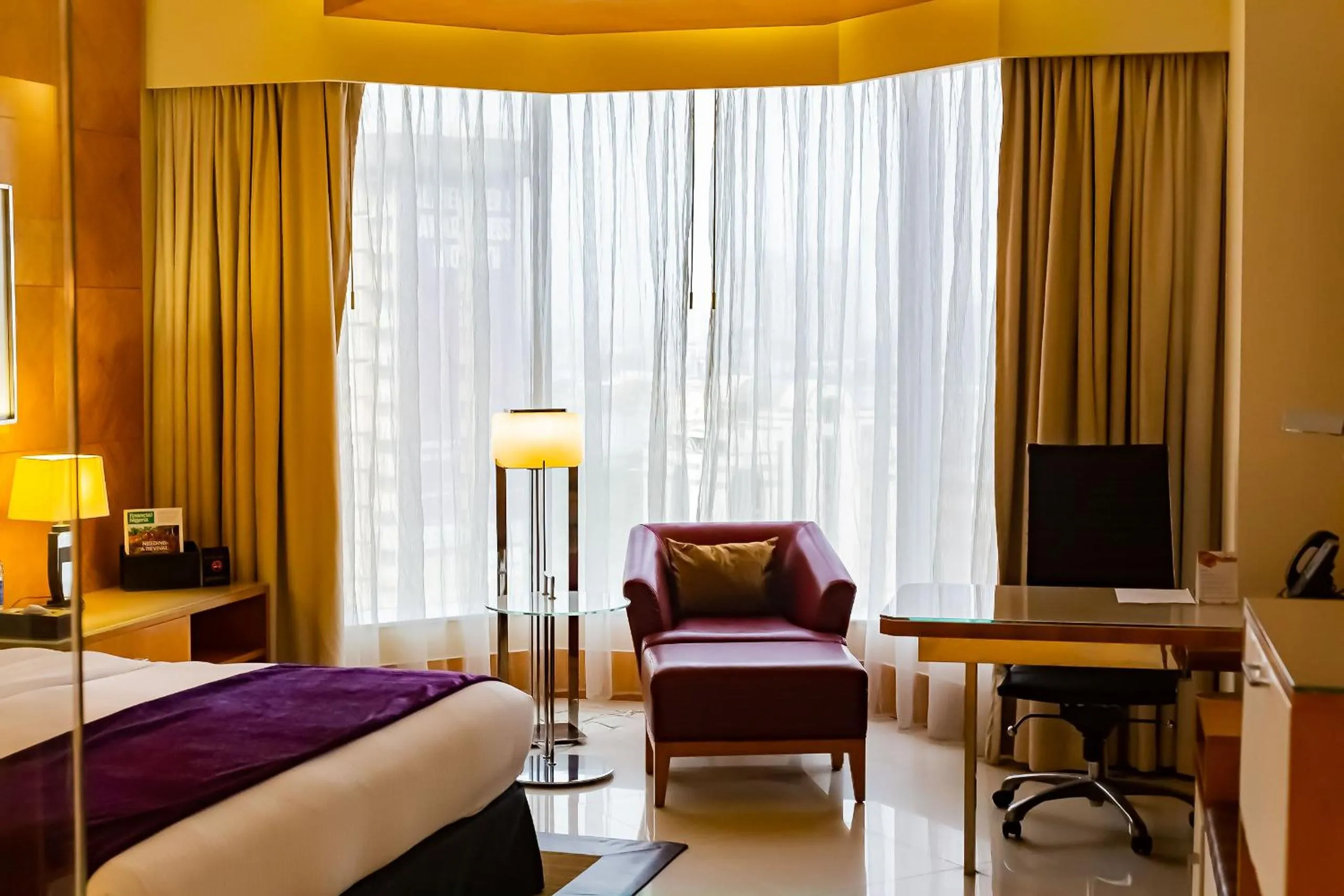 Seating area, Bed in Lagos Continental Hotel