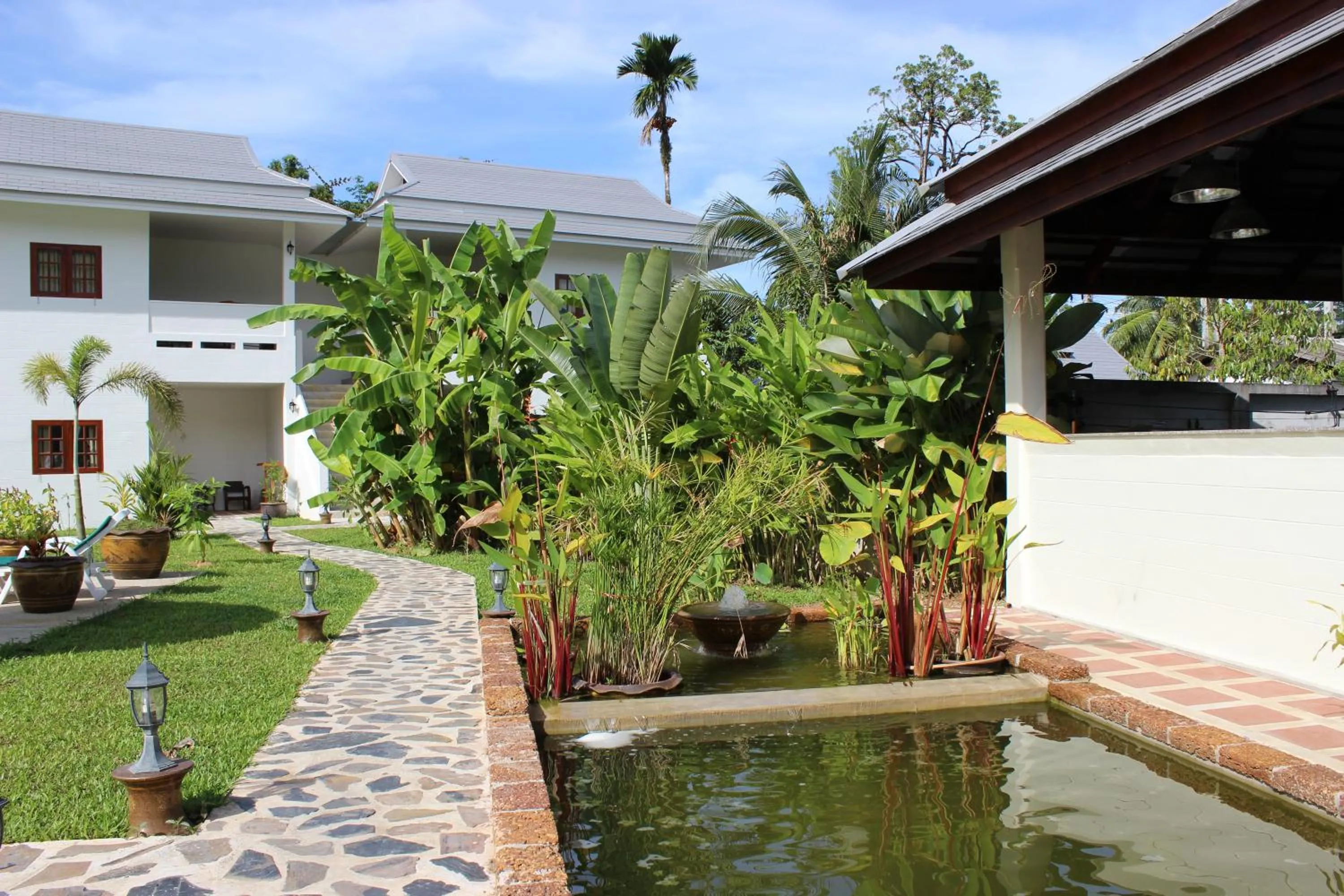 Garden view in Villa Colina Khao Lak Rooms and Bungalows - Adults Only
