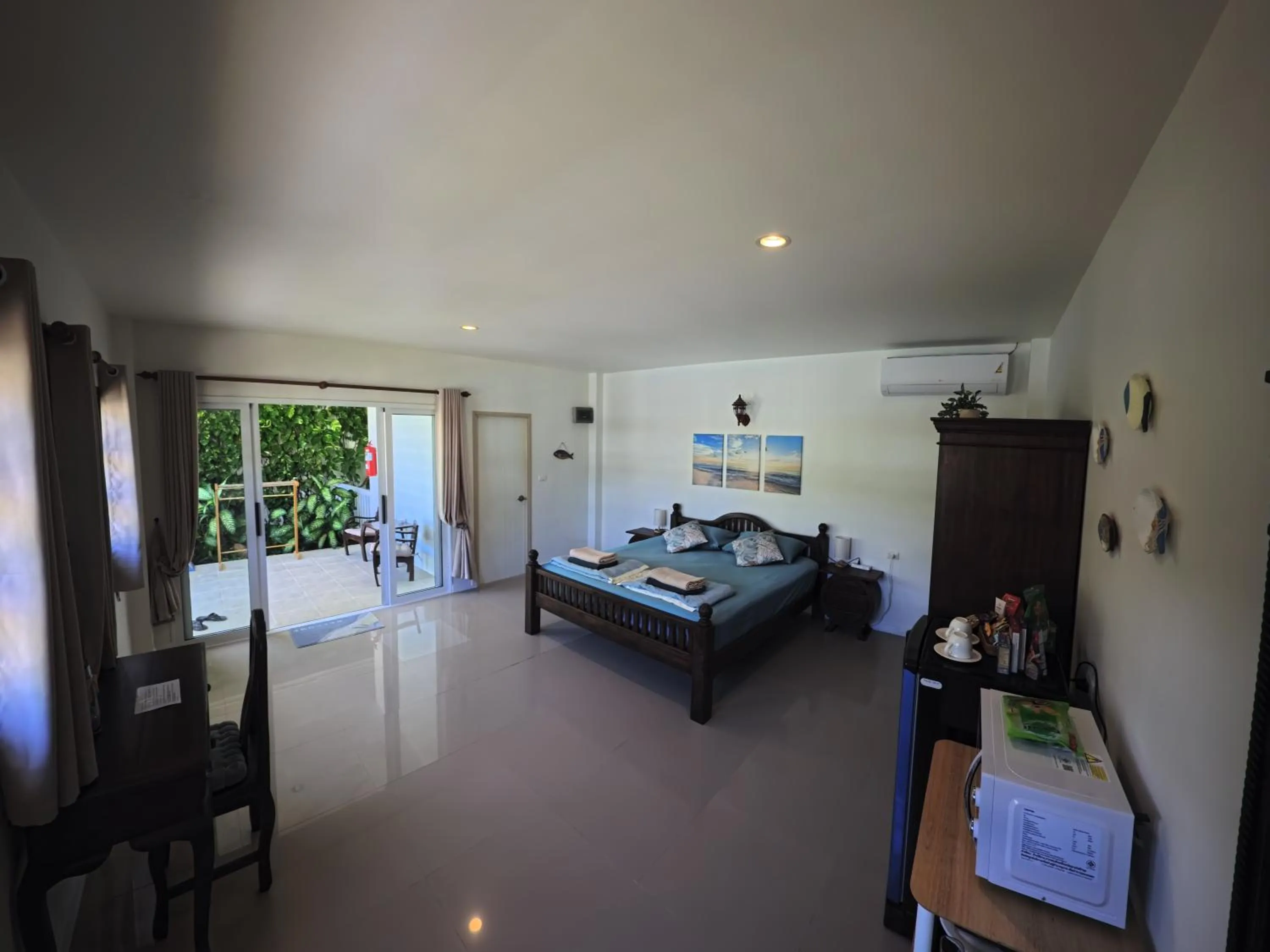 Bed in Villa Colina Khao Lak Rooms and Bungalows - Adults Only