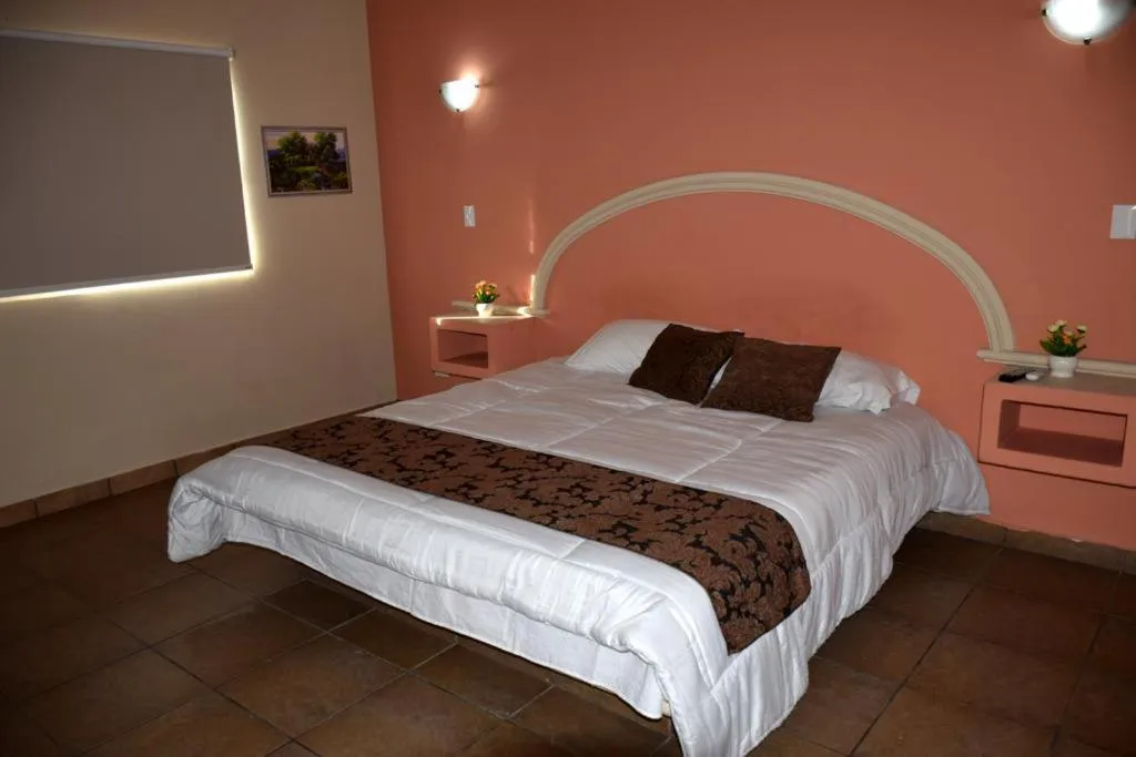 Bed in Hotel Parque Inn