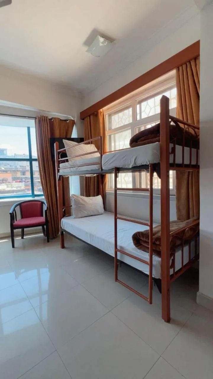 Bed in Rainbow Hotel