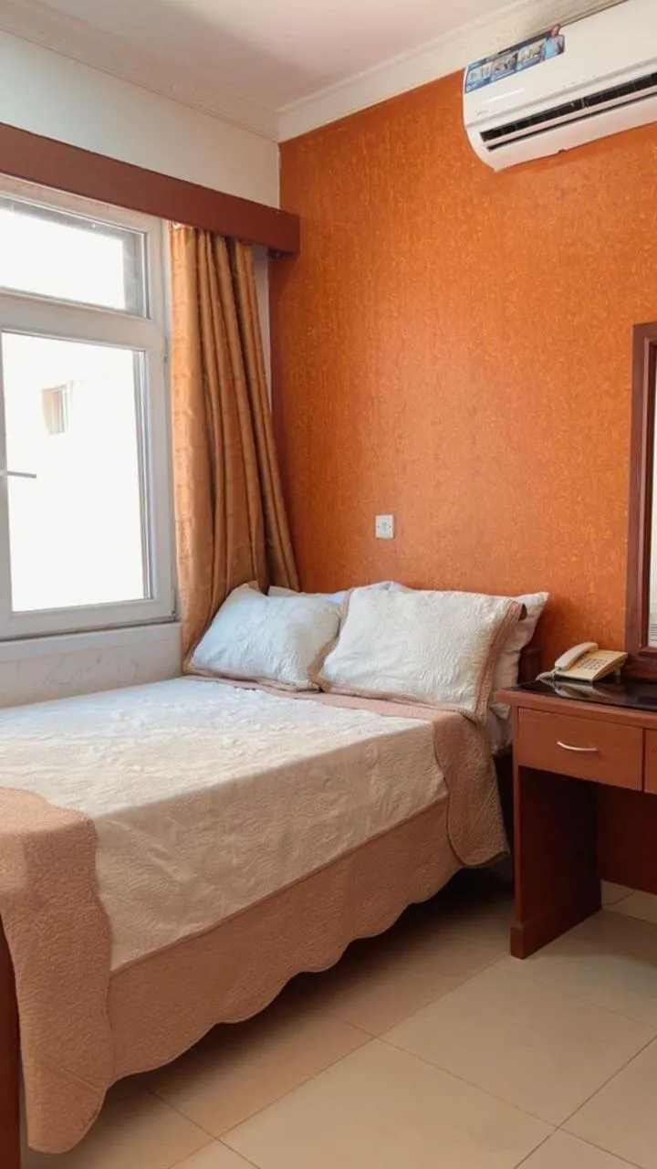 Bed in Rainbow Hotel