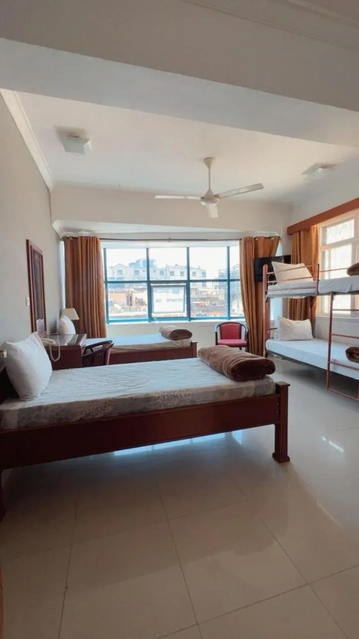 Bed in Rainbow Hotel