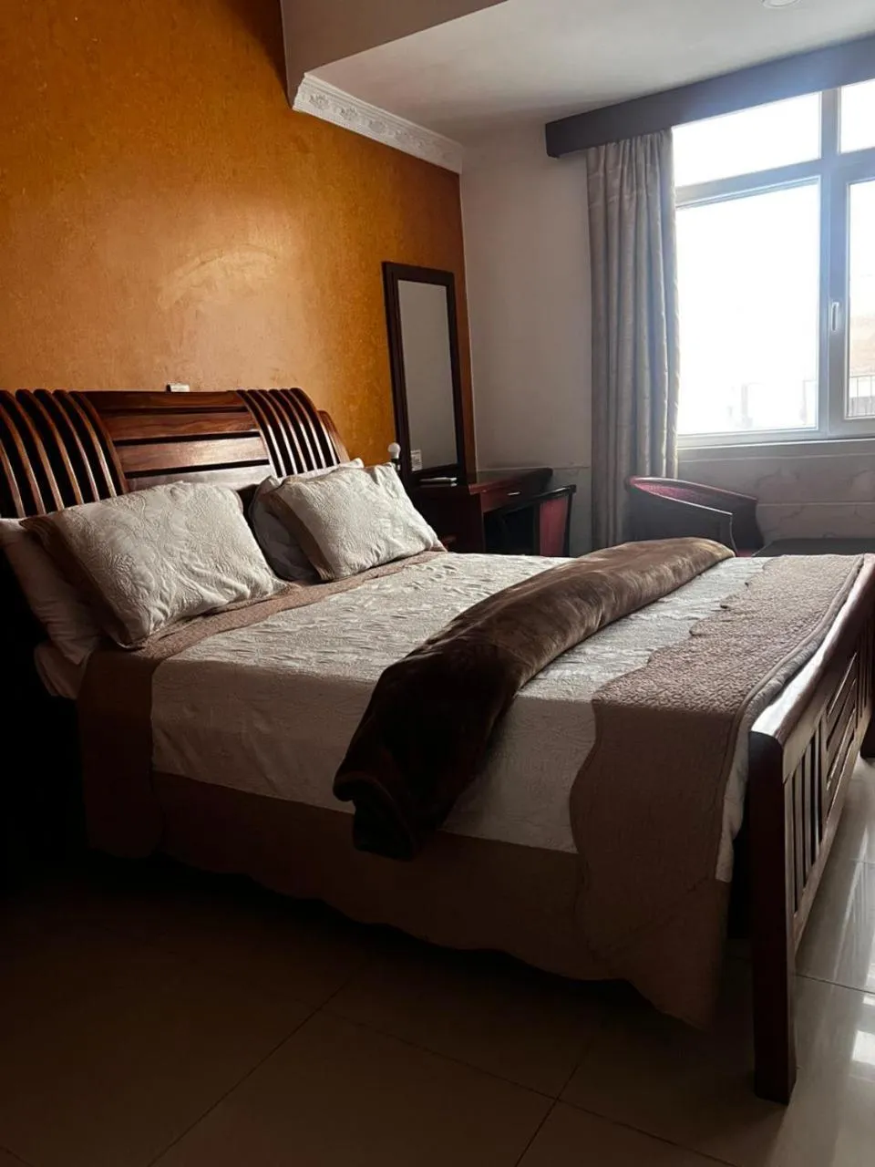 Bed in Rainbow Hotel