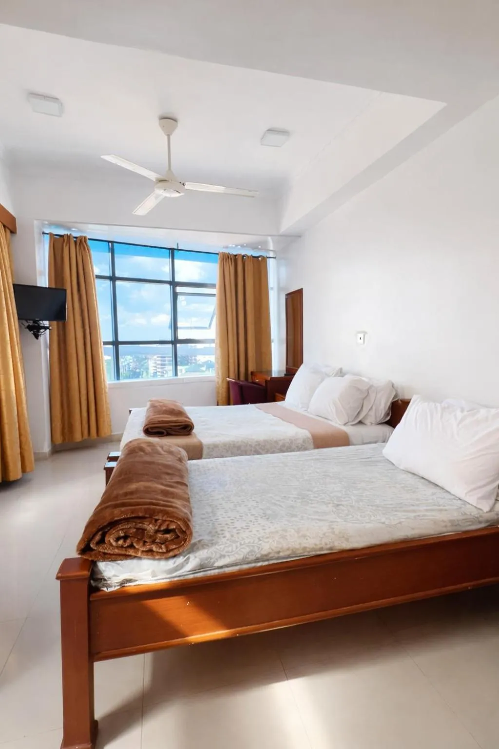 Bed in Rainbow Hotel