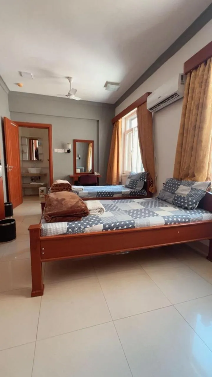 Bed in Rainbow Hotel