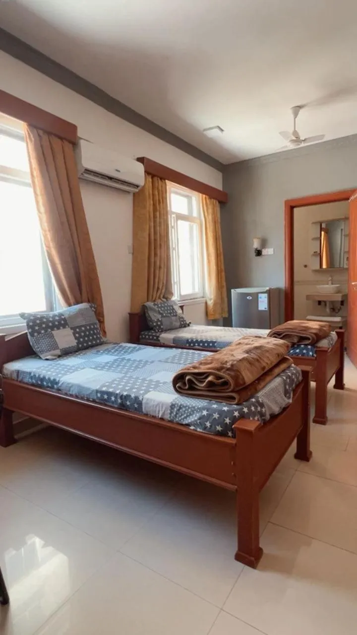 Bed in Rainbow Hotel