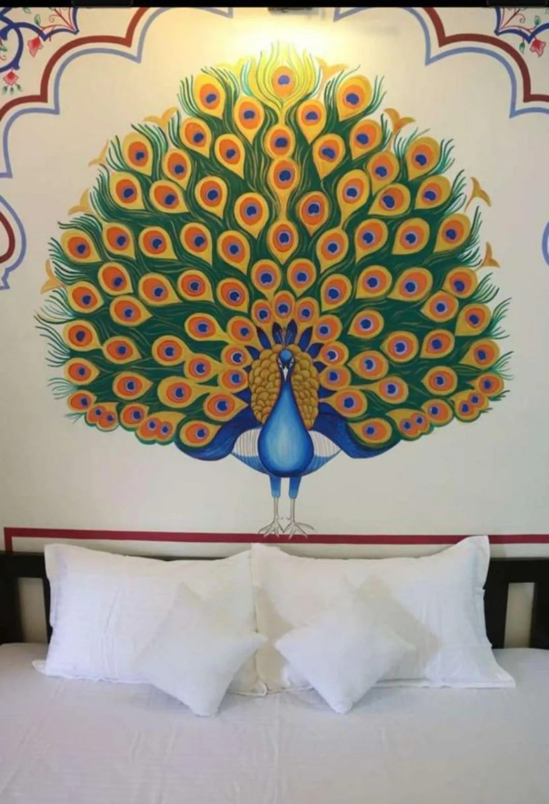 Decorative detail, Bed in Golden Peacock Heritage Home Stay
