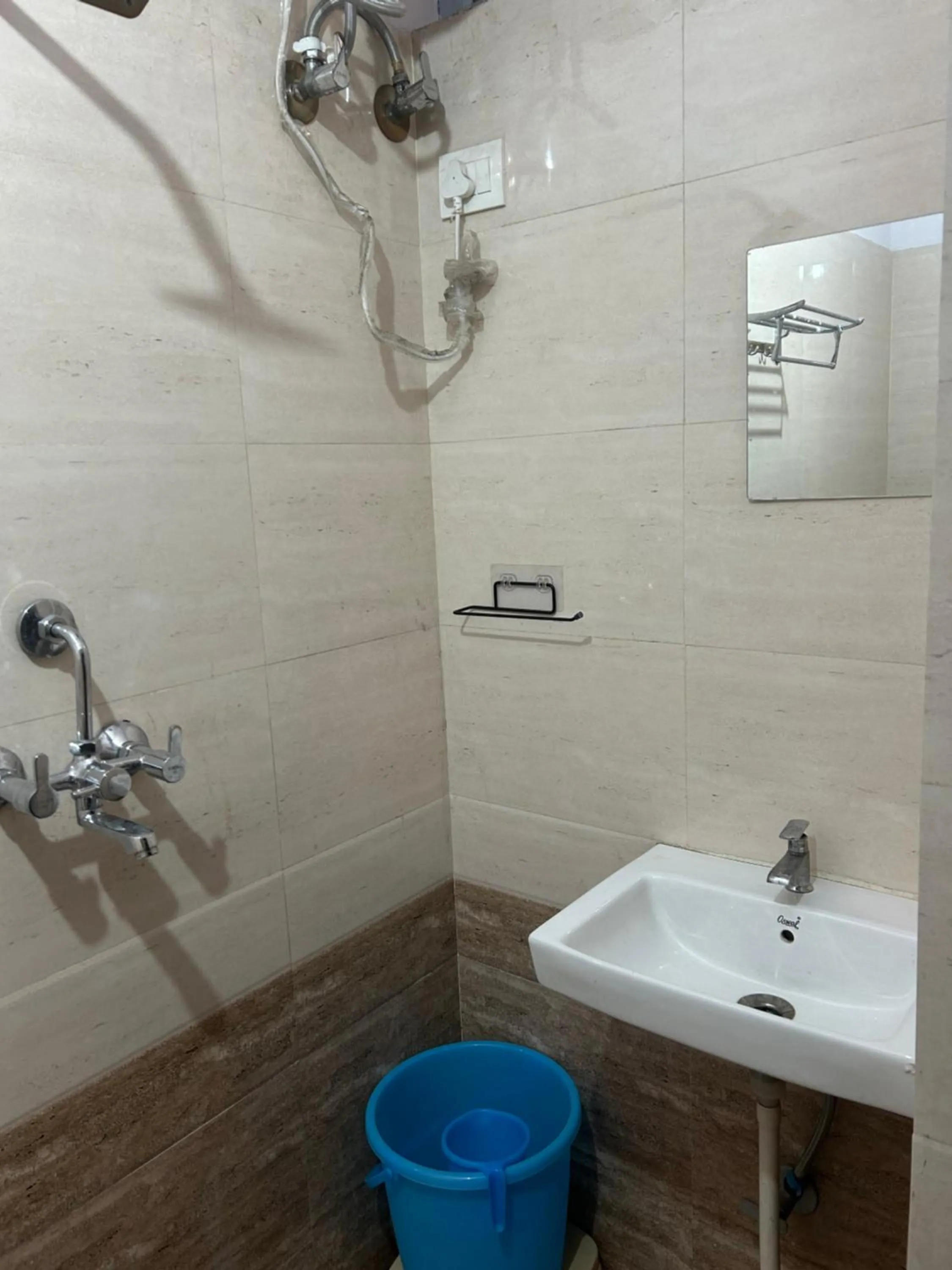 Shower in Golden Peacock Heritage Home Stay