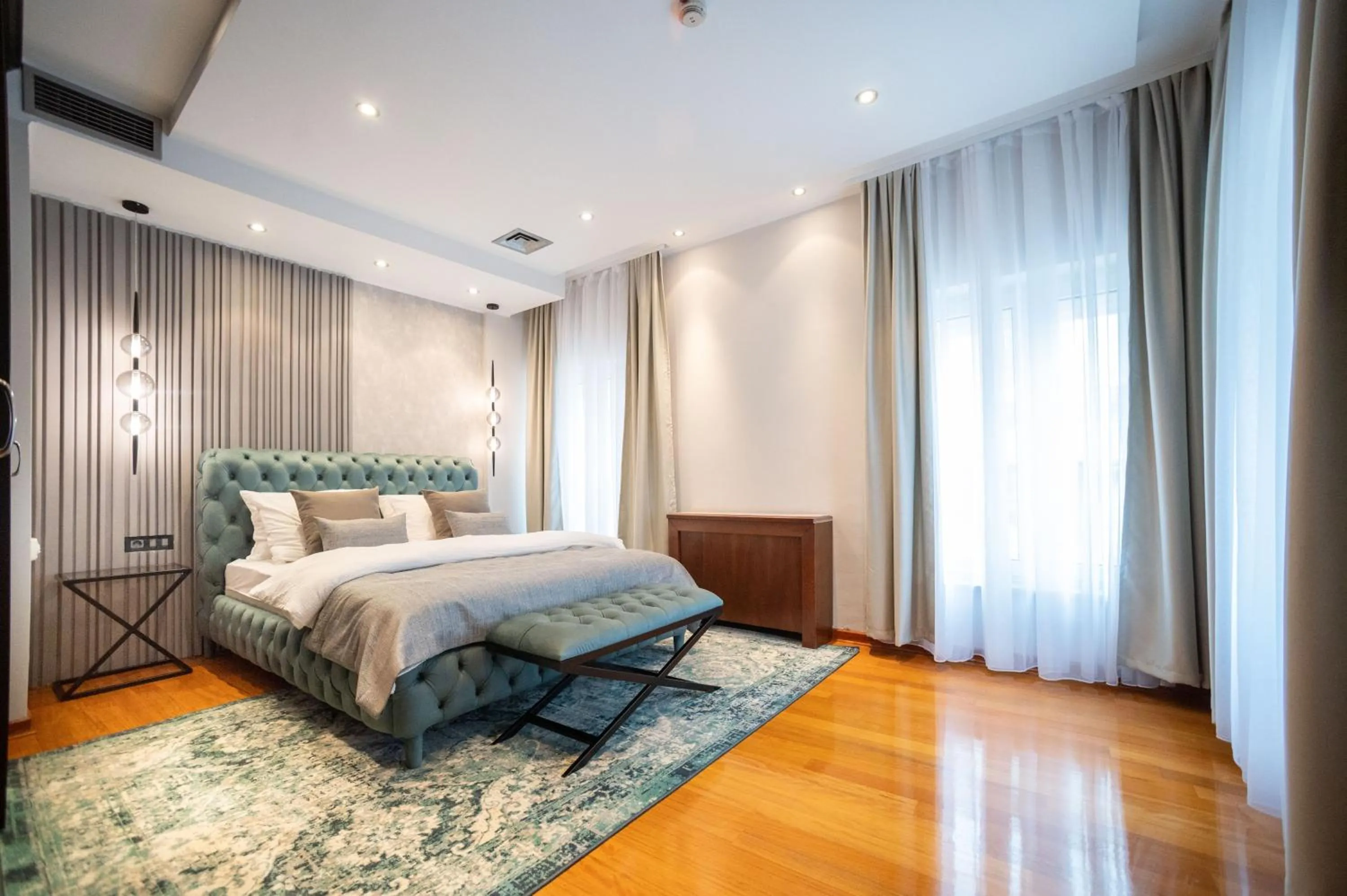 Bed in NATALI Luxury suites PARKING