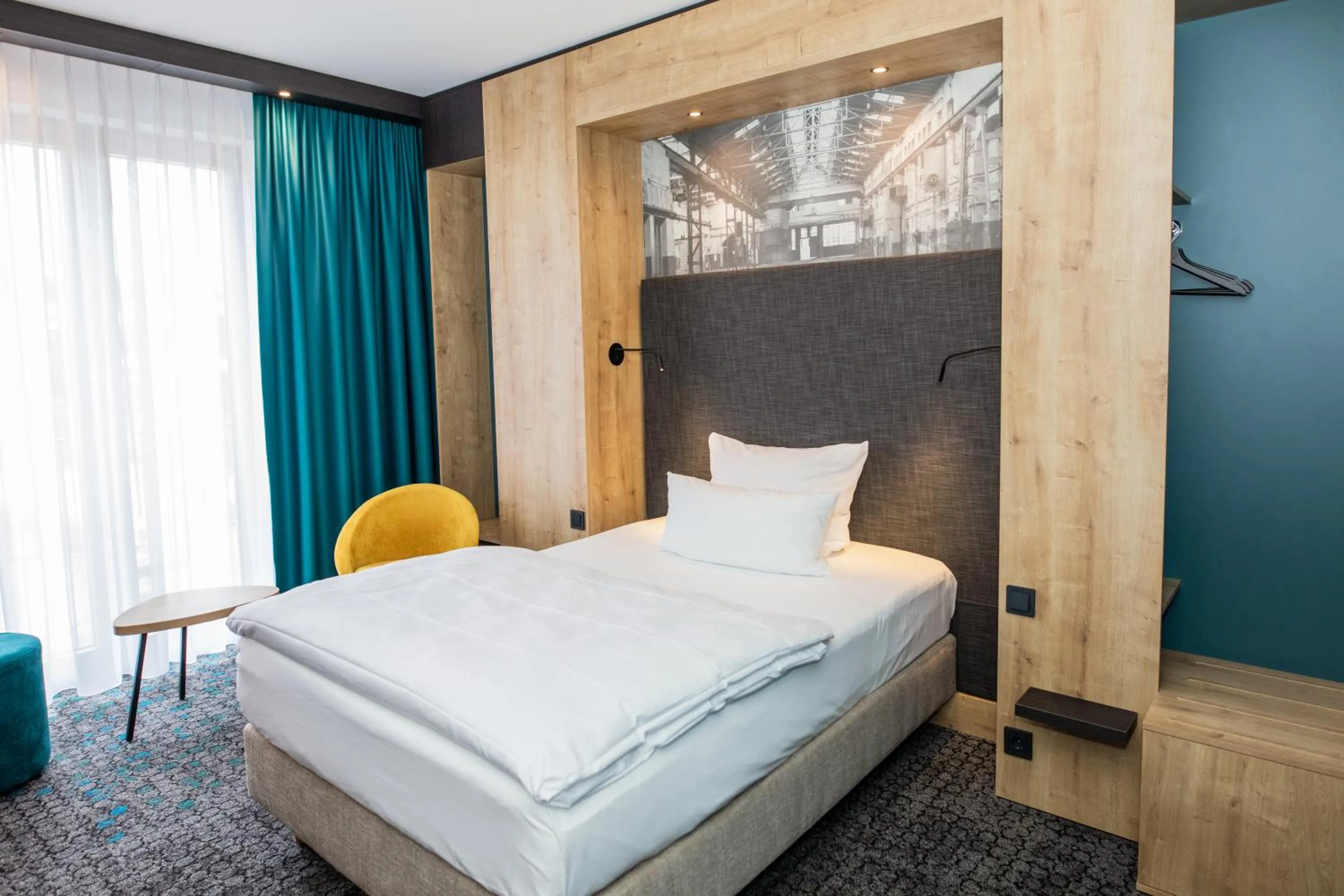 Bed in Das Steinmüller Hotel