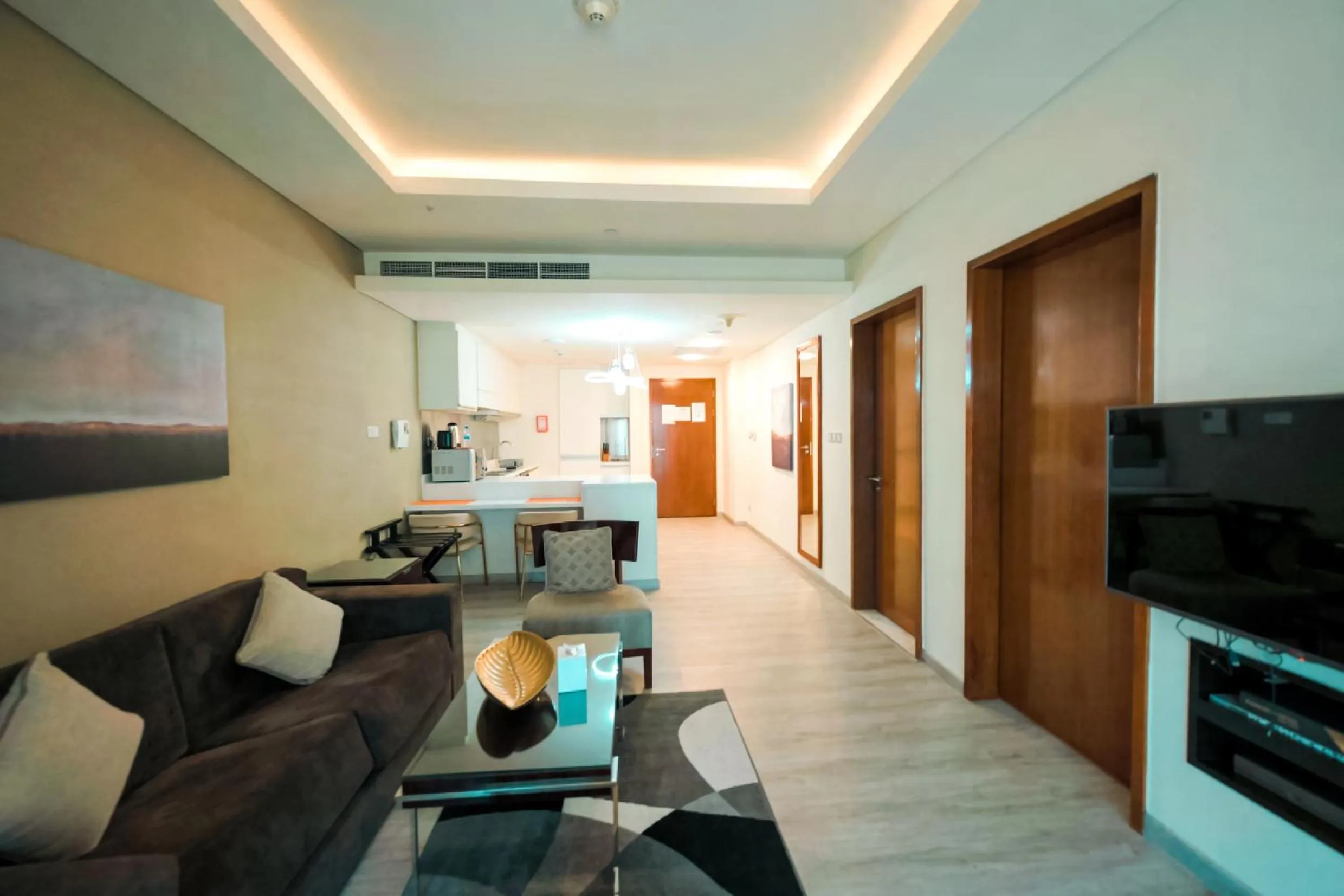 Communal lounge/ TV room in Emaar Fashion Avenue one bedroom - Formerly Address Dubai Mall Four Apple Holiday Homes
