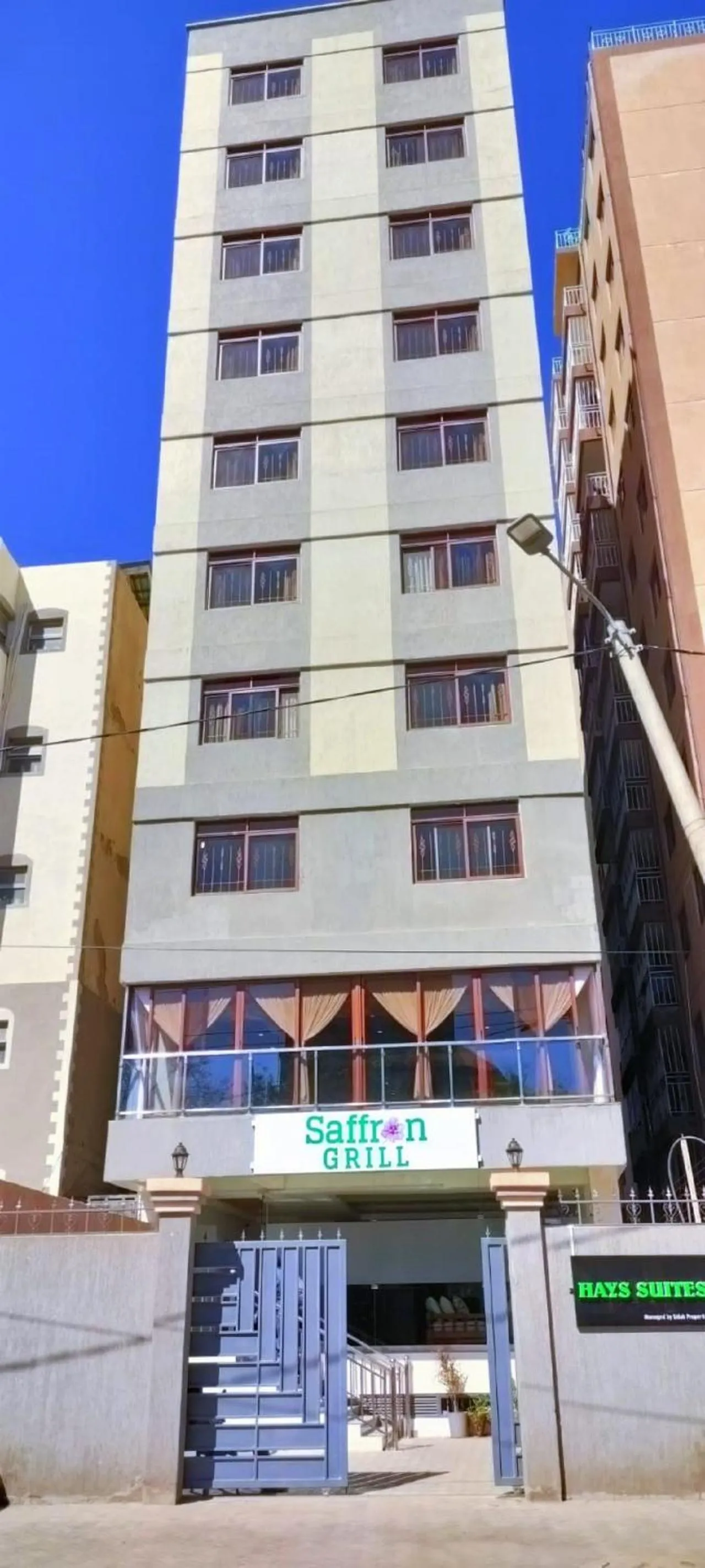 Property building in Hays Suites Hotel