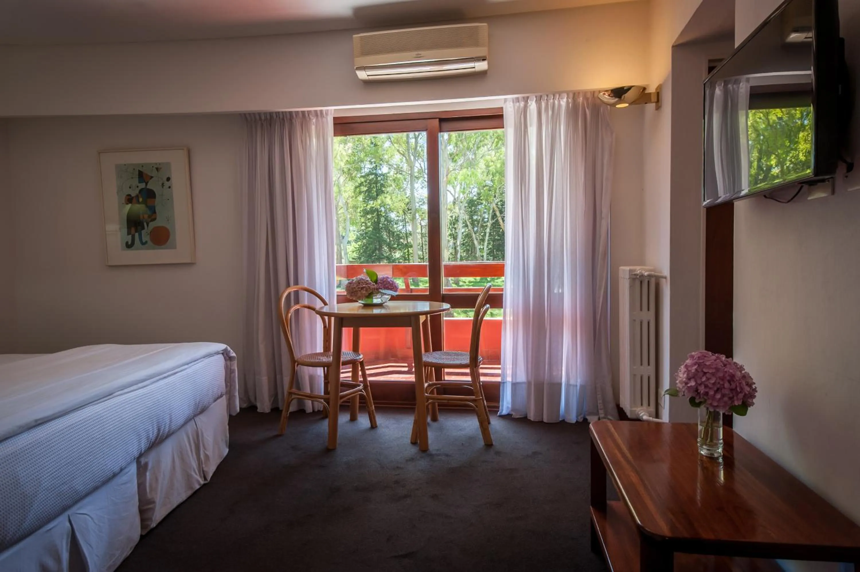 Garden view, Bed in Hotel del Bosque