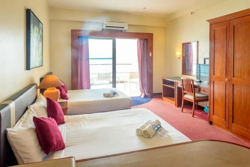 Bedroom, Bed in J Beach Suites At Rainbow Paradise