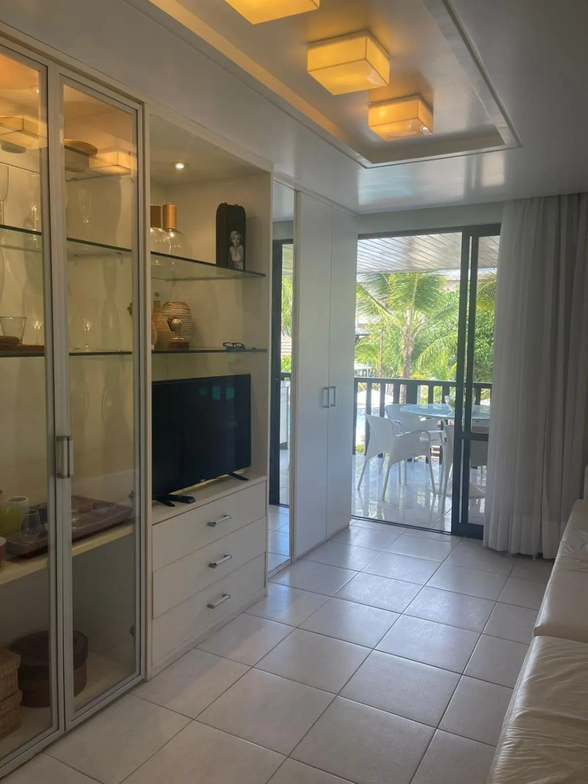 Communal lounge/ TV room in Flat NANNAI RESIDENCE