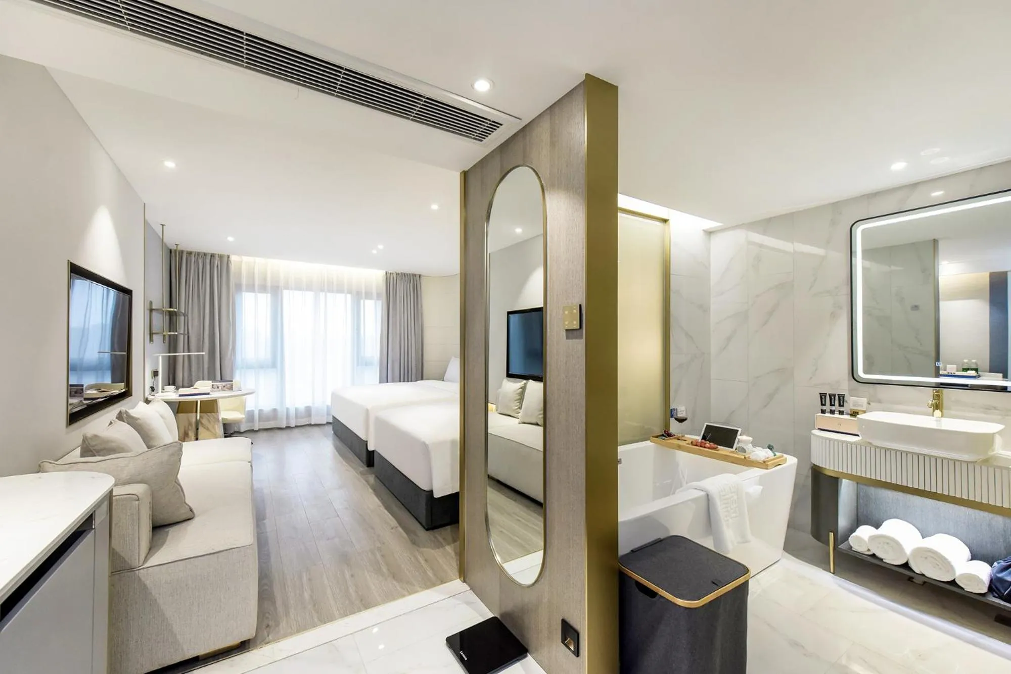 Bedroom in Kuanrong Suites Hotel Liangjiang love sea shopping park