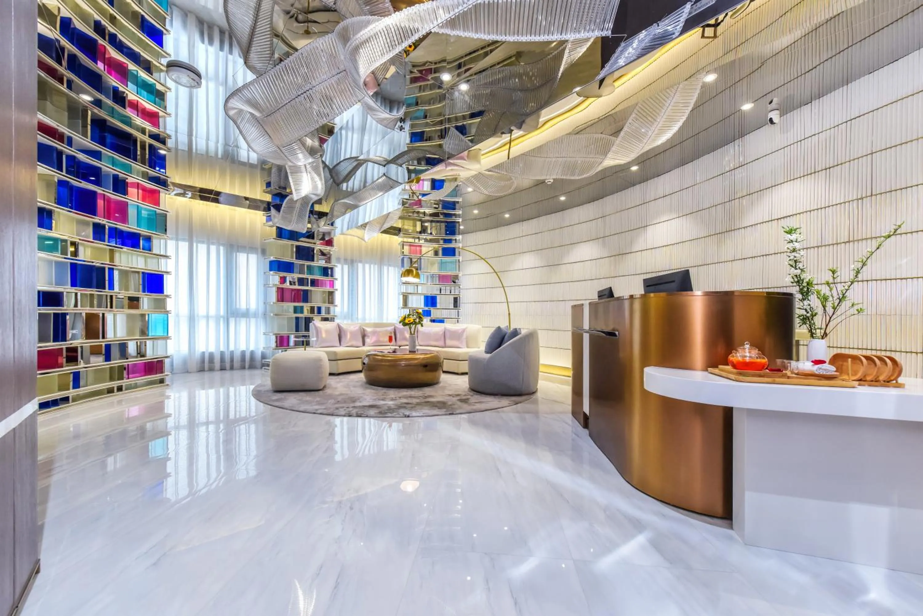 Lobby or reception in Kuanrong Suites Hotel Liangjiang love sea shopping park