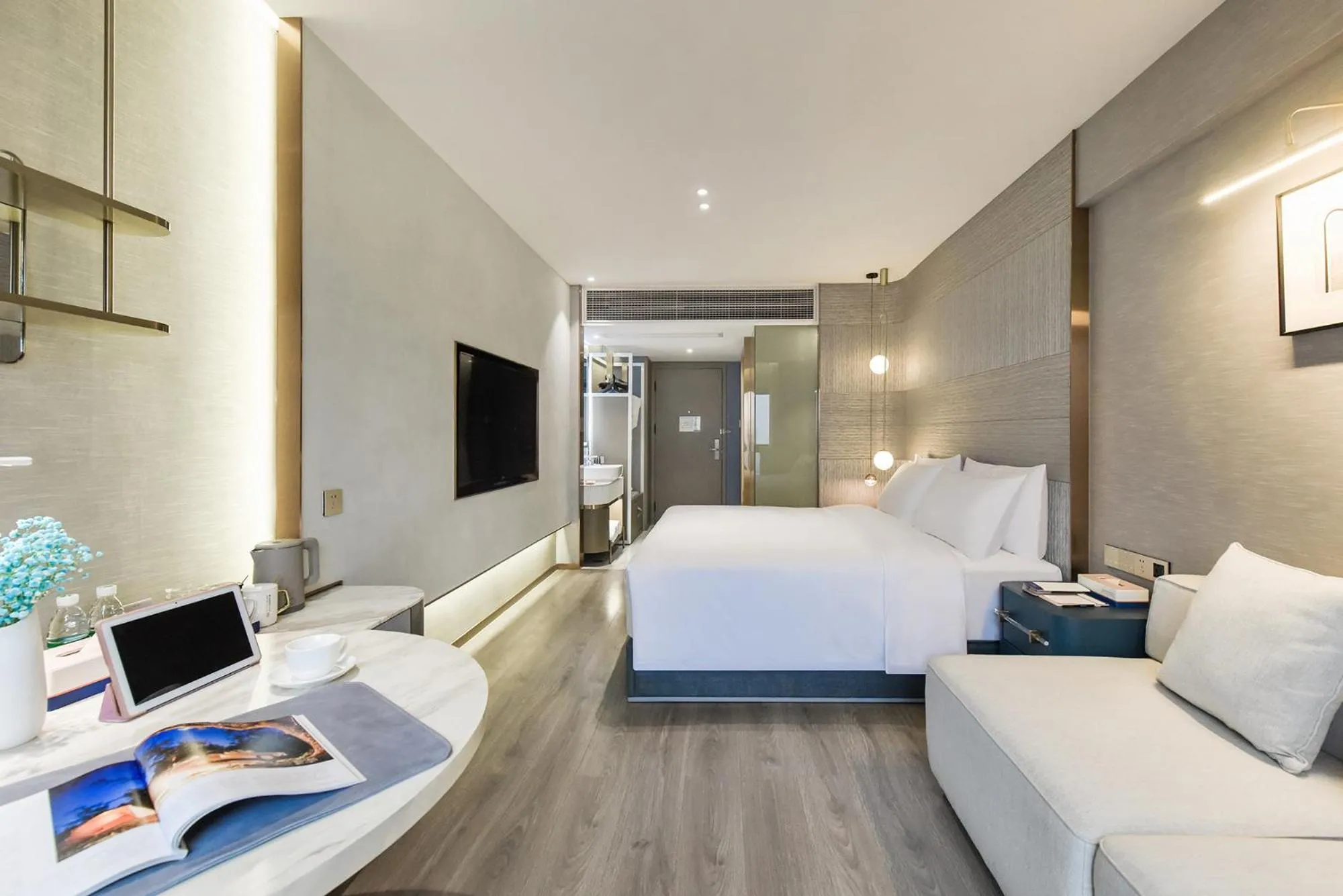 Bed in Kuanrong Suites Hotel Liangjiang love sea shopping park