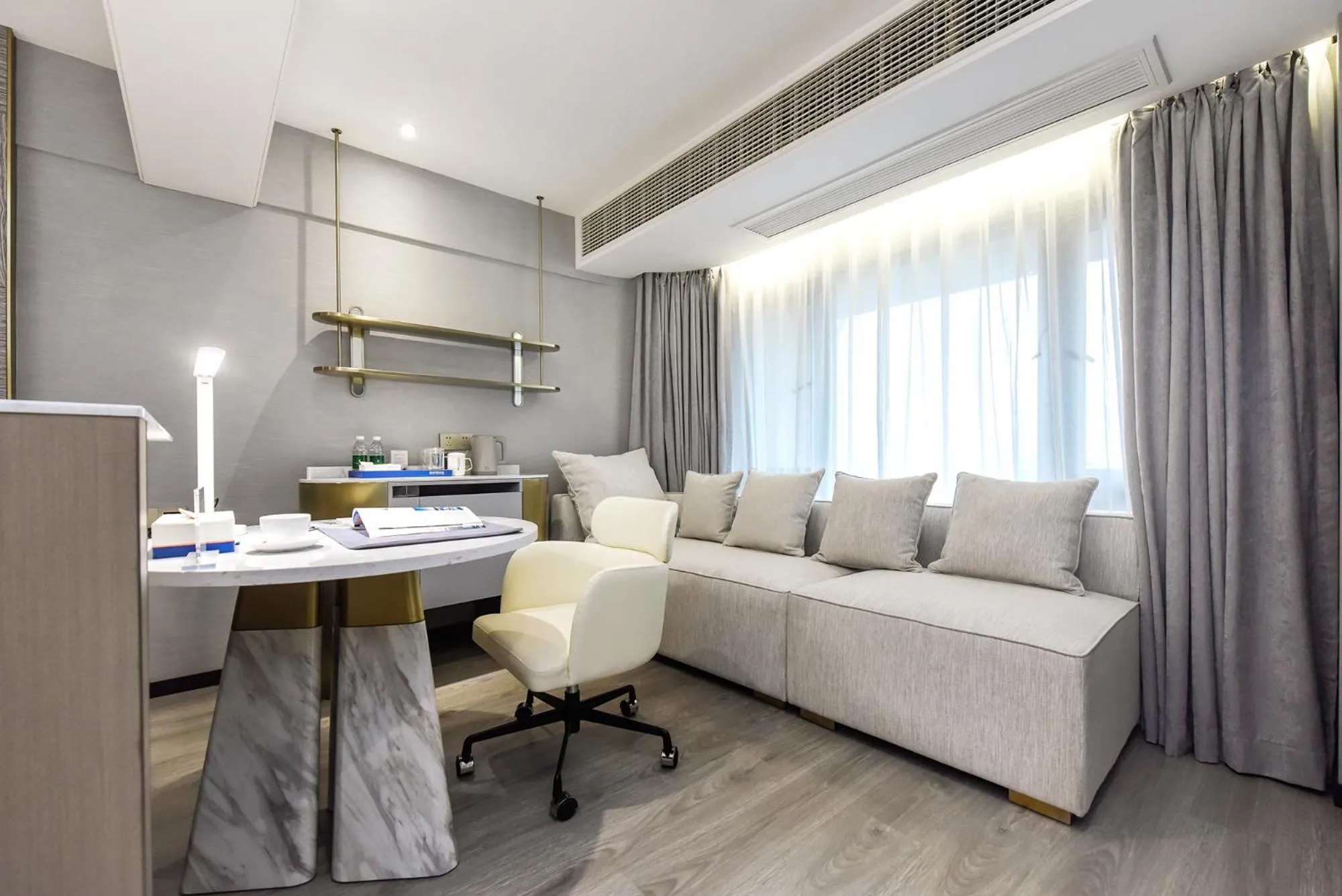 Living room in Kuanrong Suites Hotel Liangjiang love sea shopping park