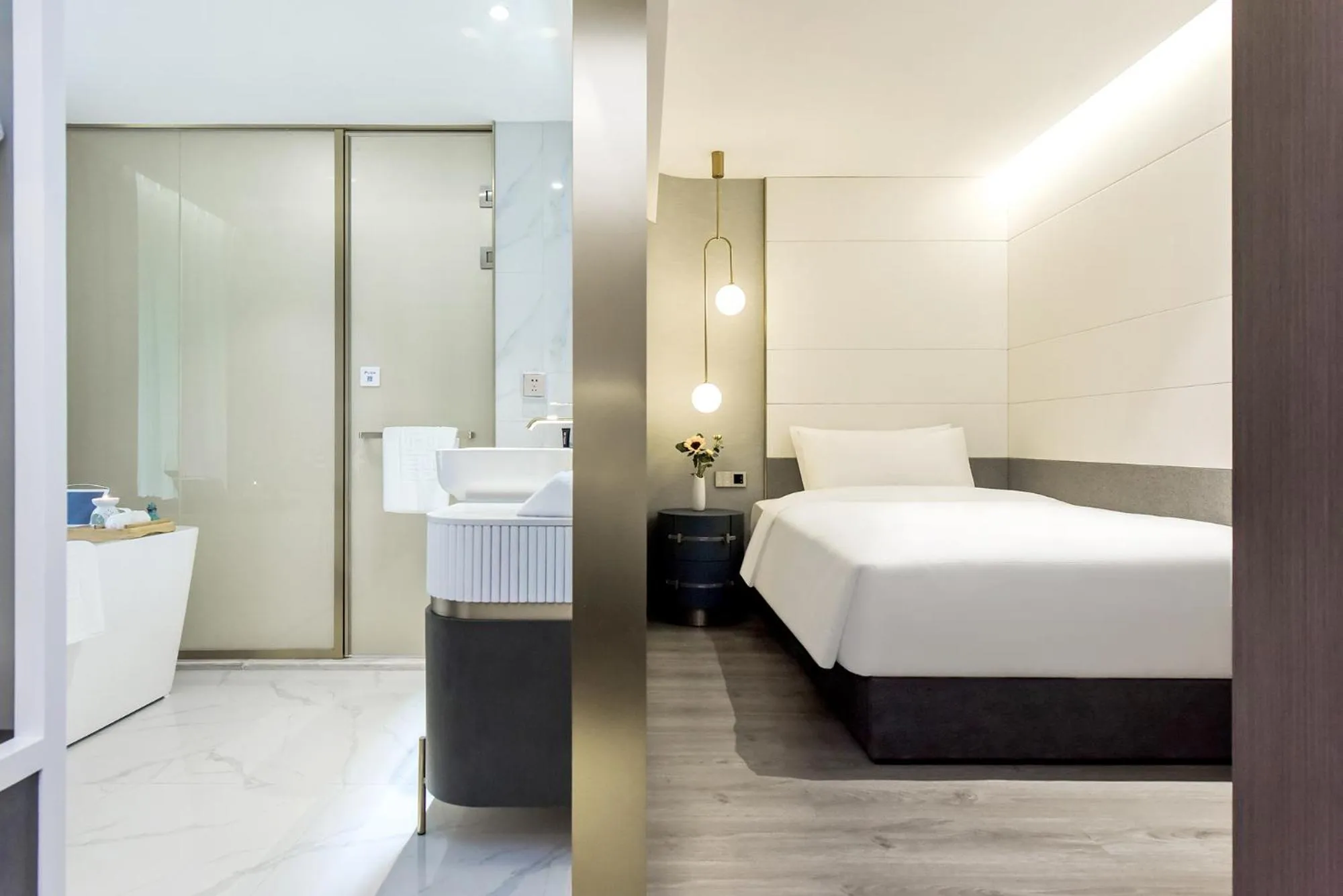 Bed in Kuanrong Suites Hotel Liangjiang love sea shopping park