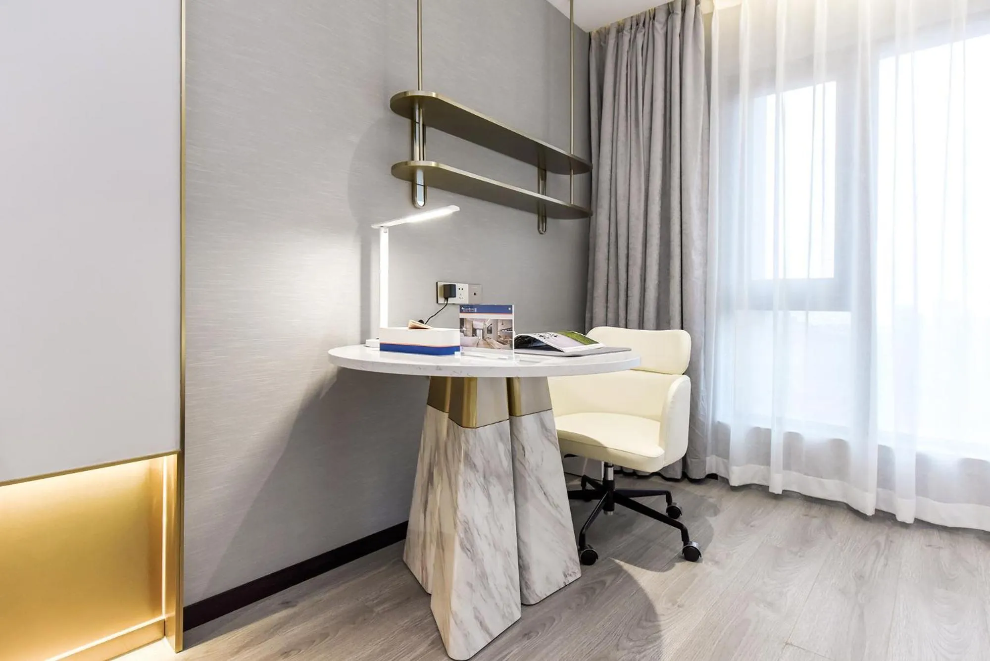 Seating area in Kuanrong Suites Hotel Liangjiang love sea shopping park