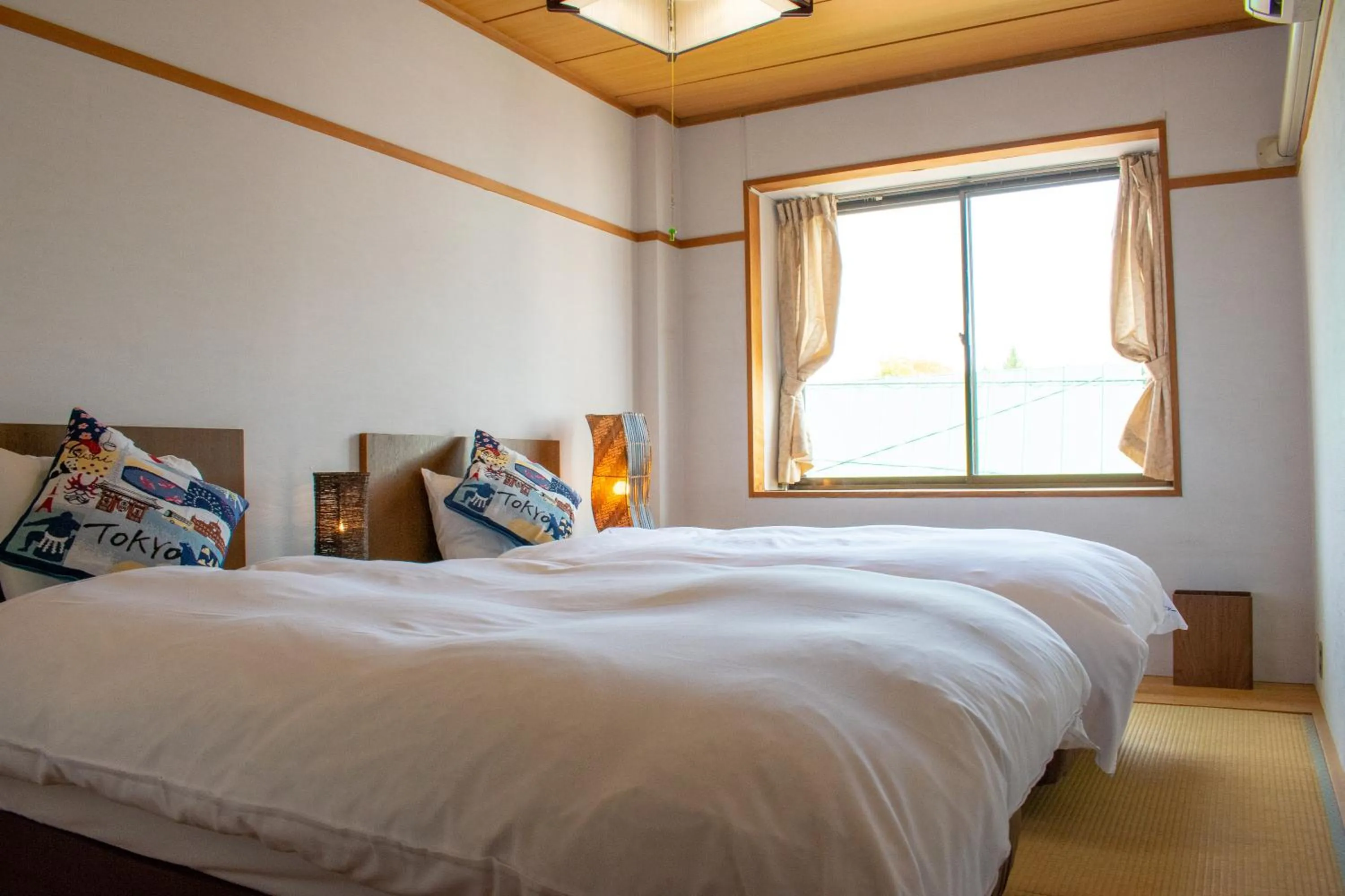 Bed in T Square Hakuba