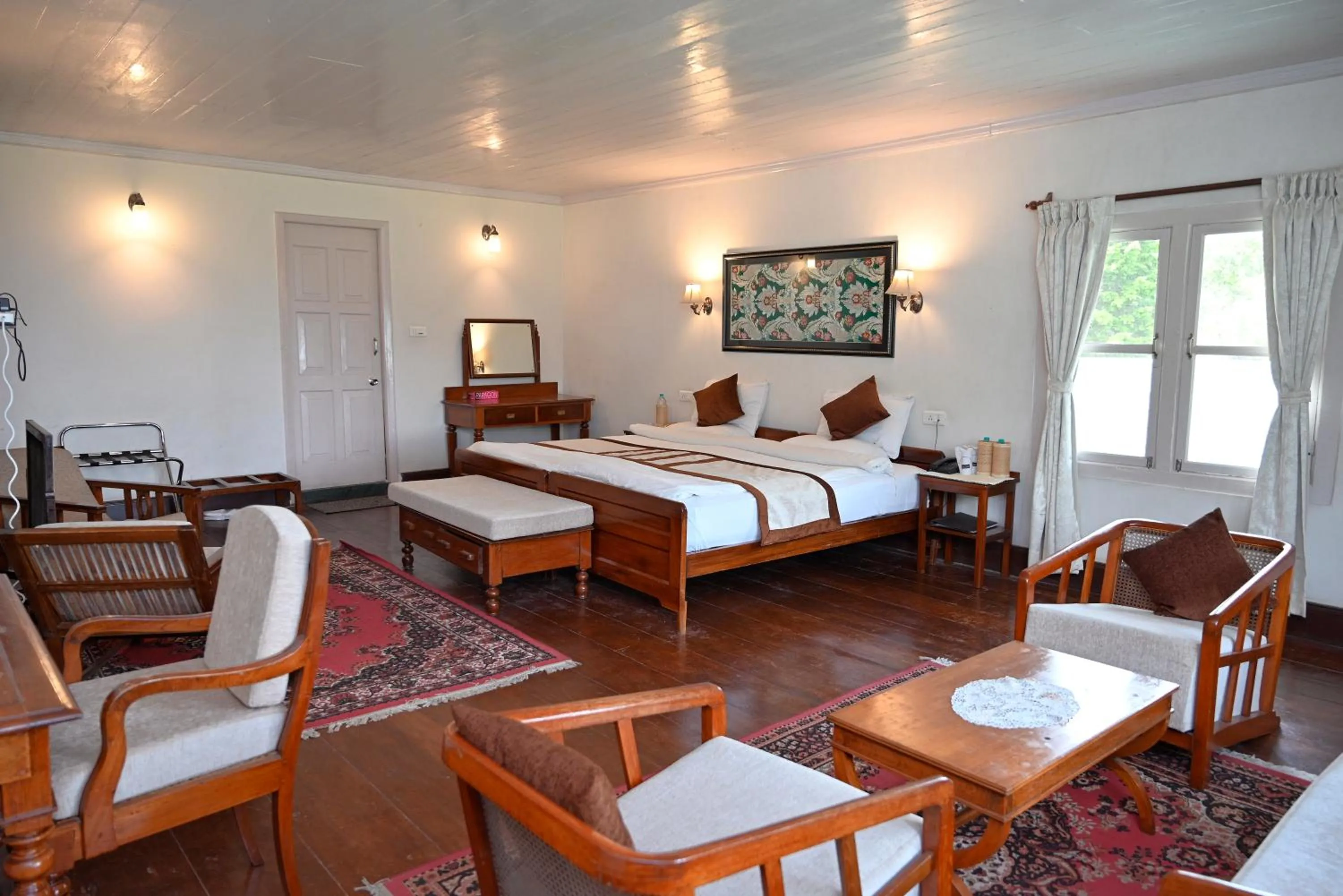 Photo of the whole room, Bed in Tumsong Tea Retreat