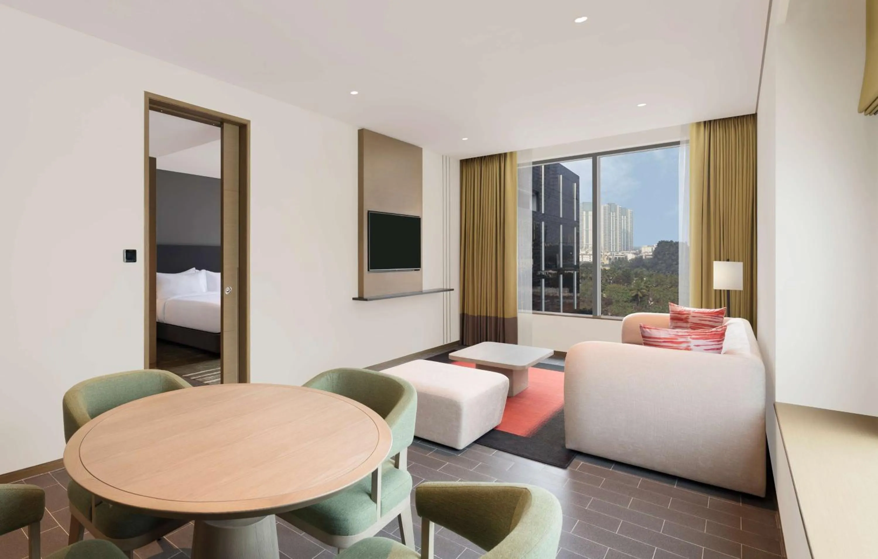 Living room, Bed in Hilton Garden Inn Bengaluru Embassy Manyata Business Park