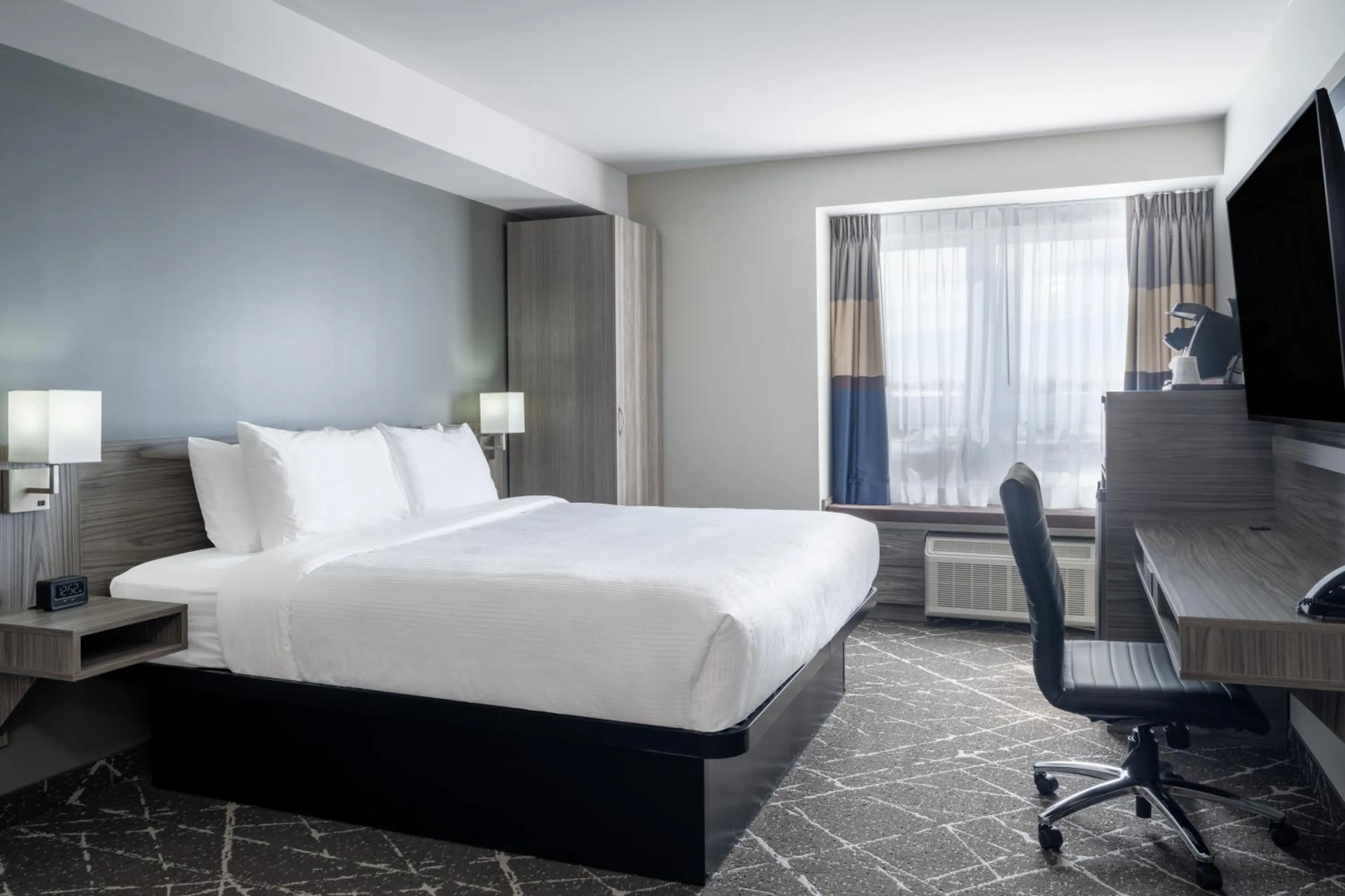 Bed in Microtel Inn & Suites by Wyndham Kanata Ottawa West