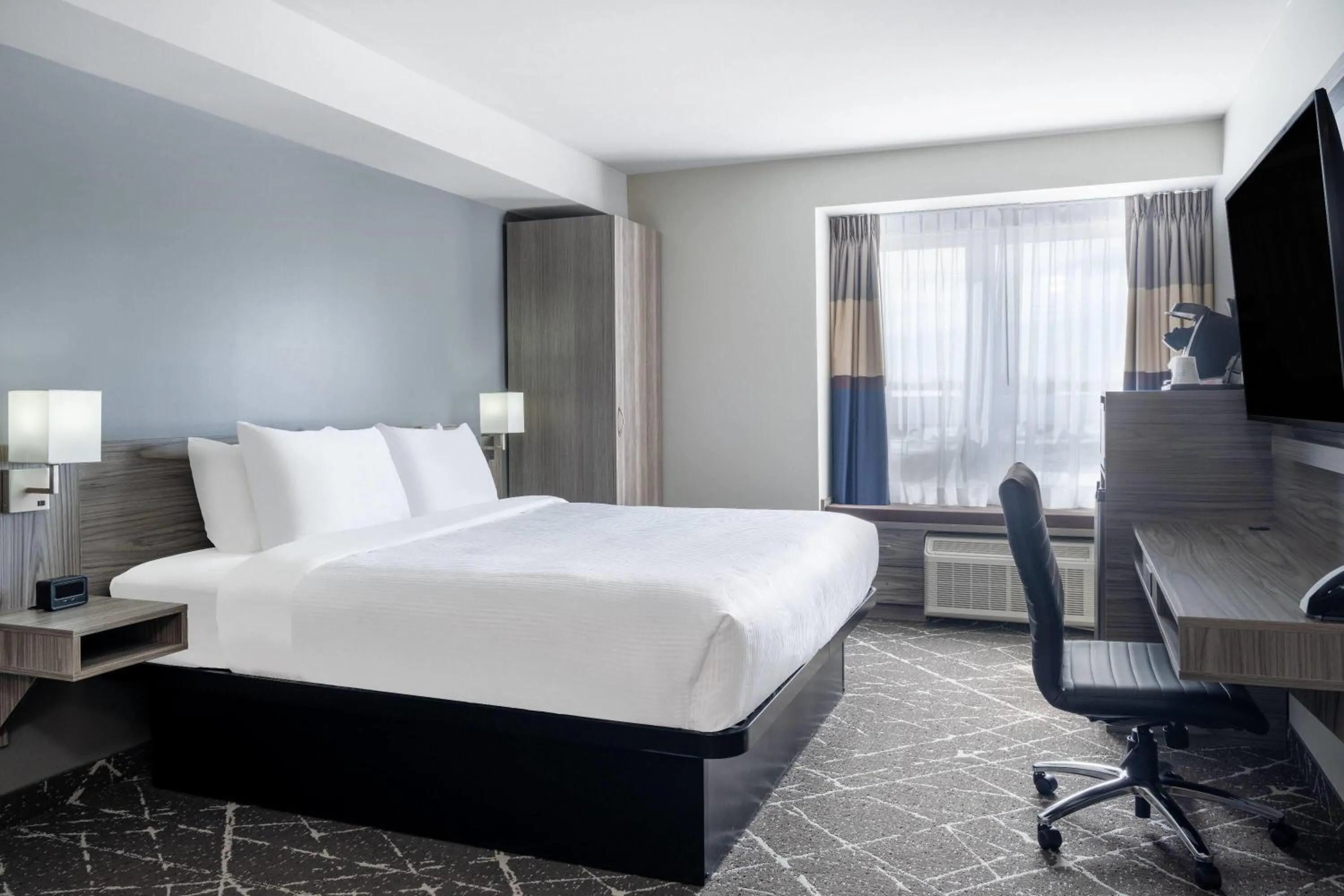Bed in Microtel Inn & Suites by Wyndham Kanata Ottawa West