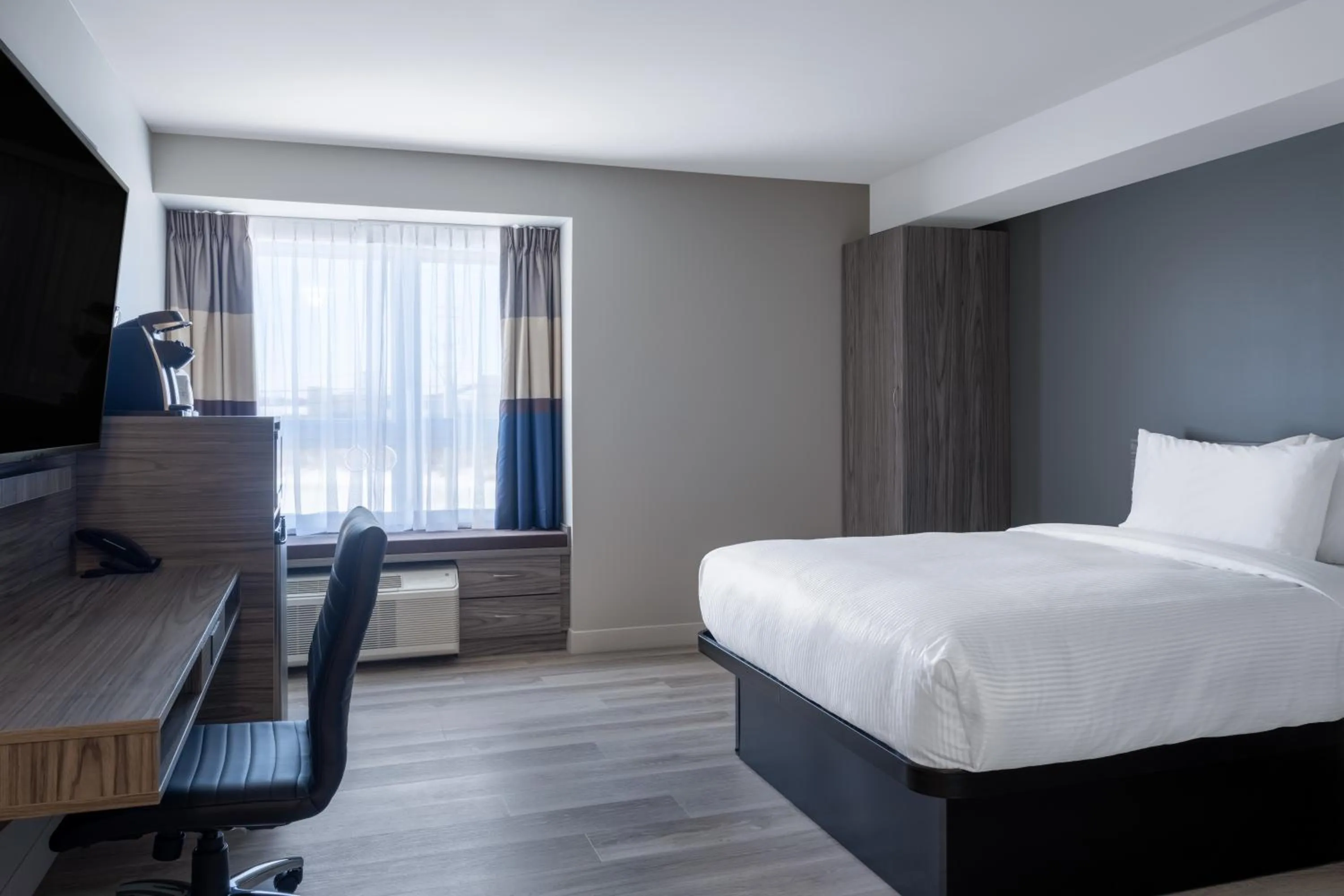 Bed in Microtel Inn & Suites by Wyndham Kanata Ottawa West